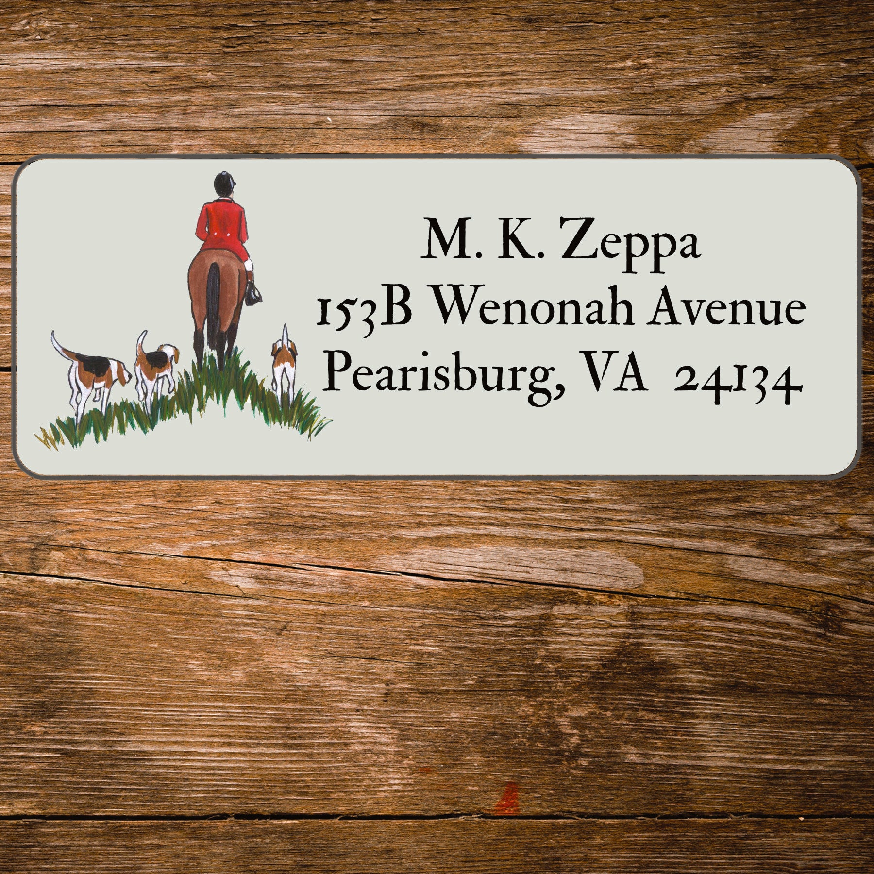 Address label with a fox hunting scene illustration on a wooden background