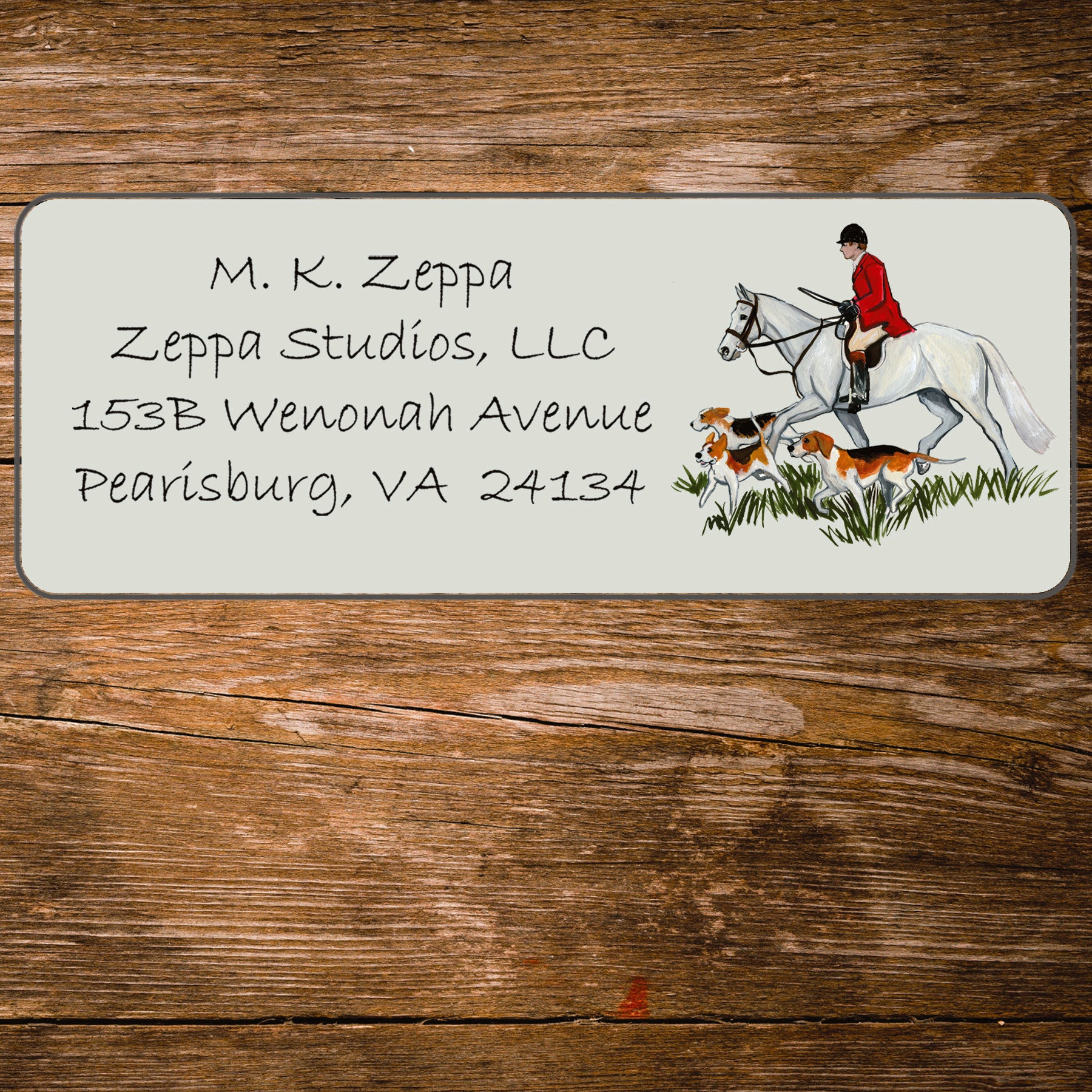Address label with a fox hunting scene illustration on a wooden background