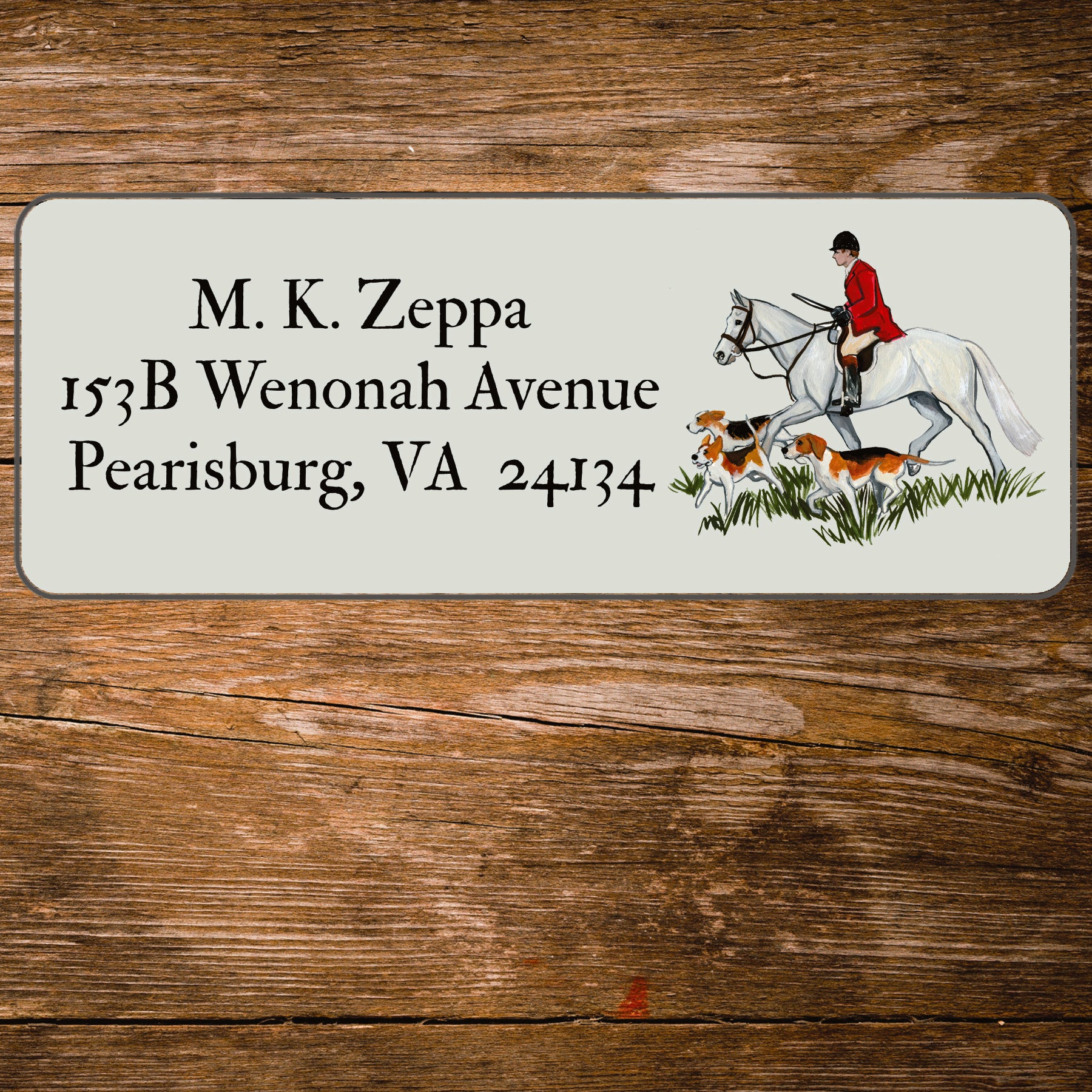 Address label with a fox hunting scene illustration on a wooden background