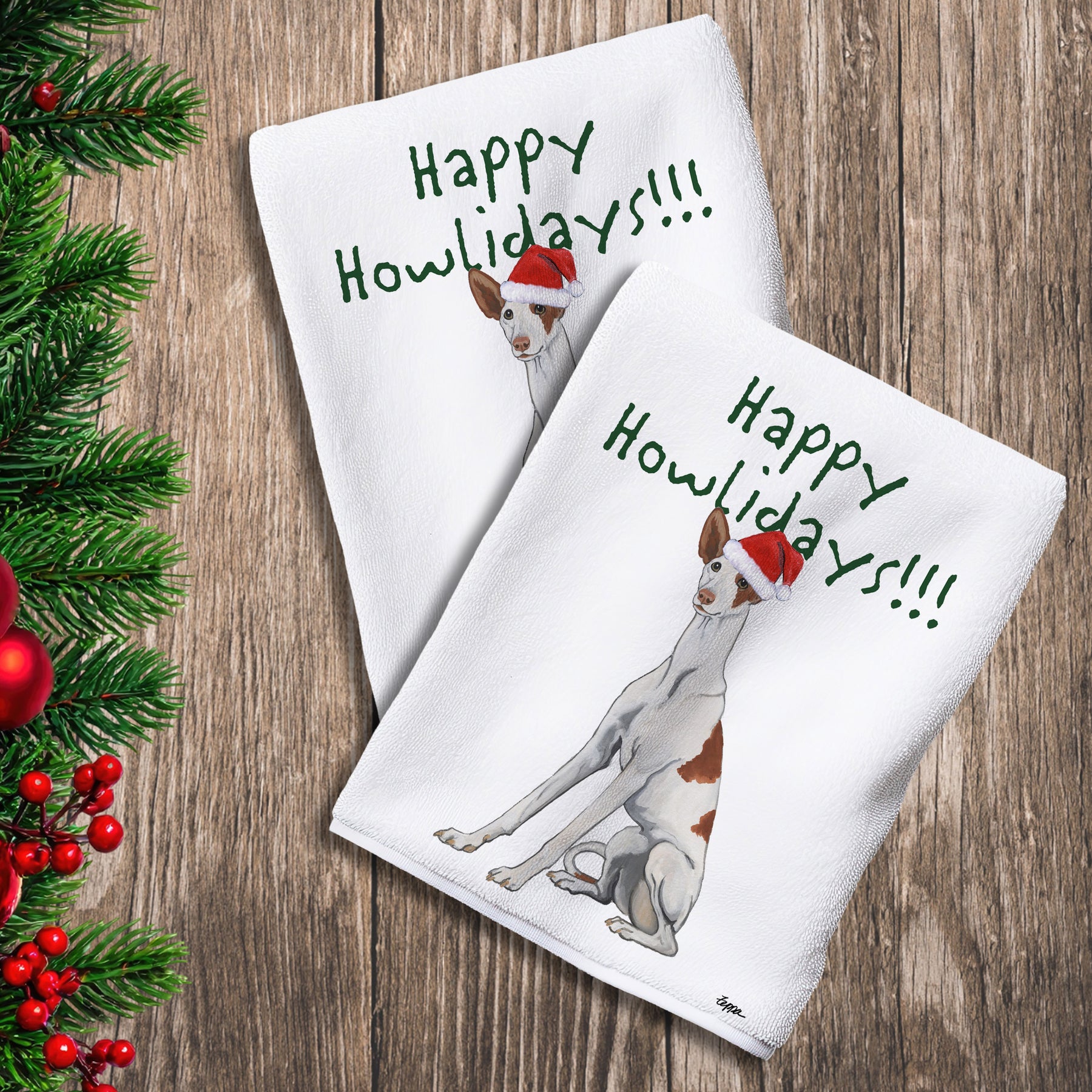 2 Kitchen Towels with an Ibizan Hound in a Santa Hat and Happy Howlidays text.
