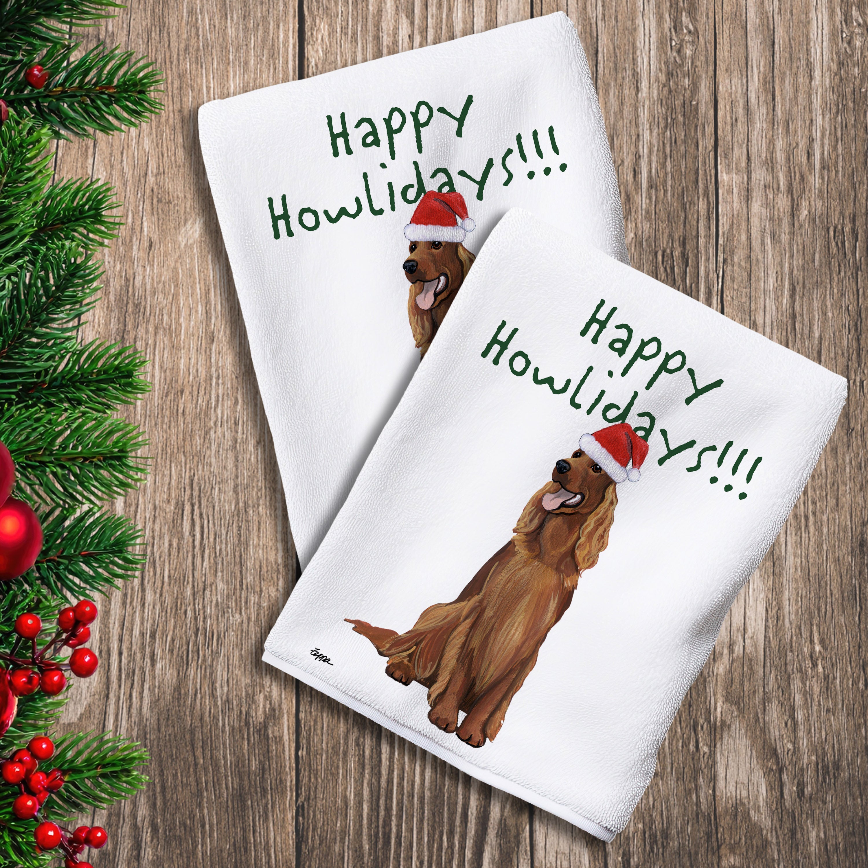 2 Kitchen Towels with an Irish Setter in a Santa Hat and Happy Howlidays text.