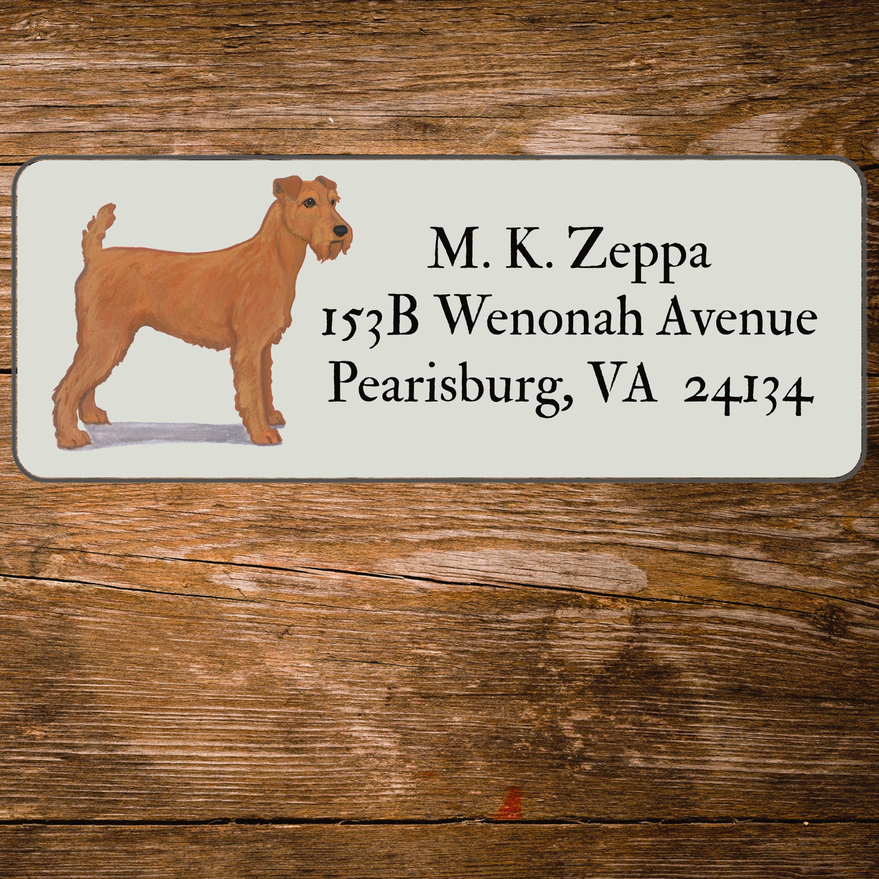 Return address label with a Irish Terrier illustration.