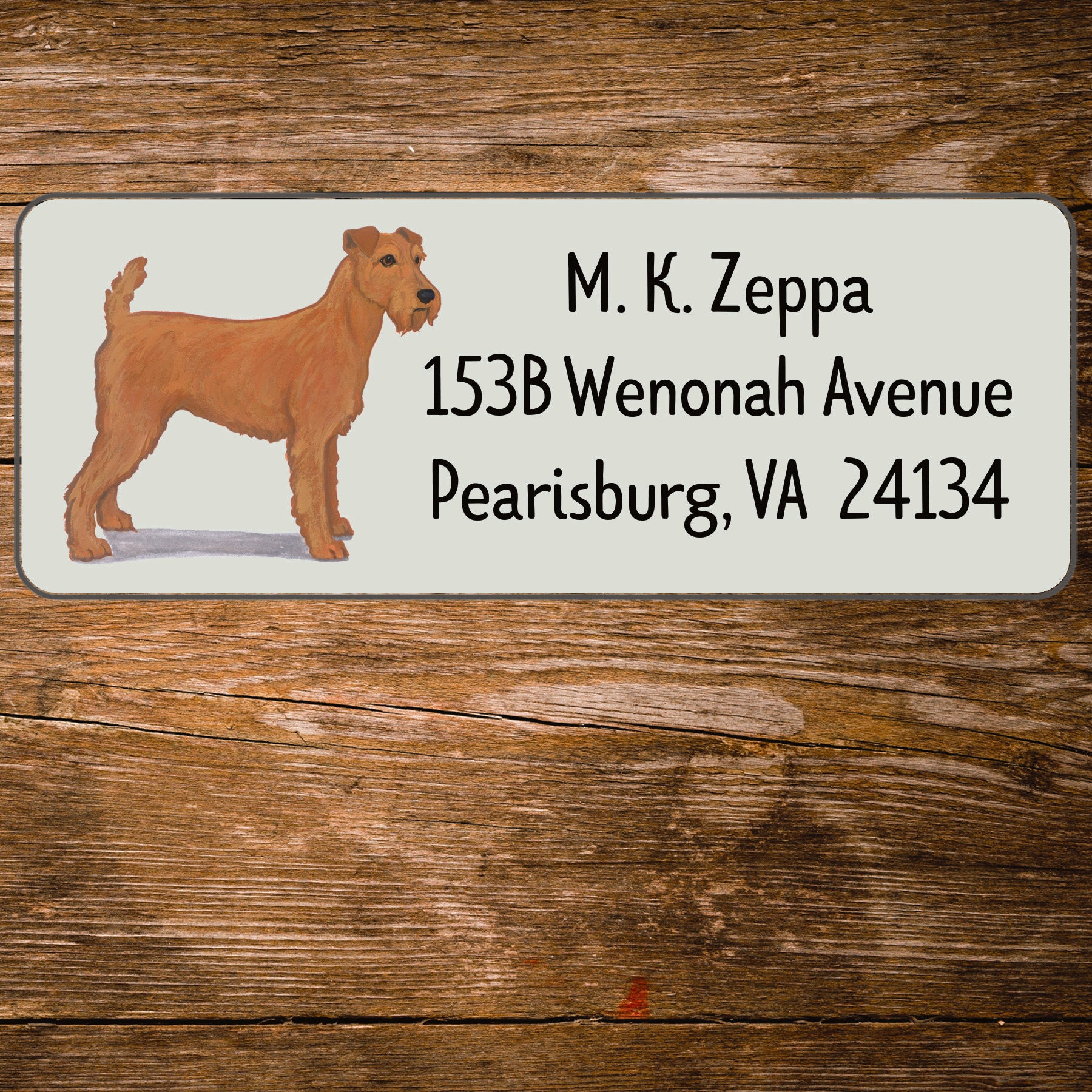 Return address label with a Irish Terrier illustration.