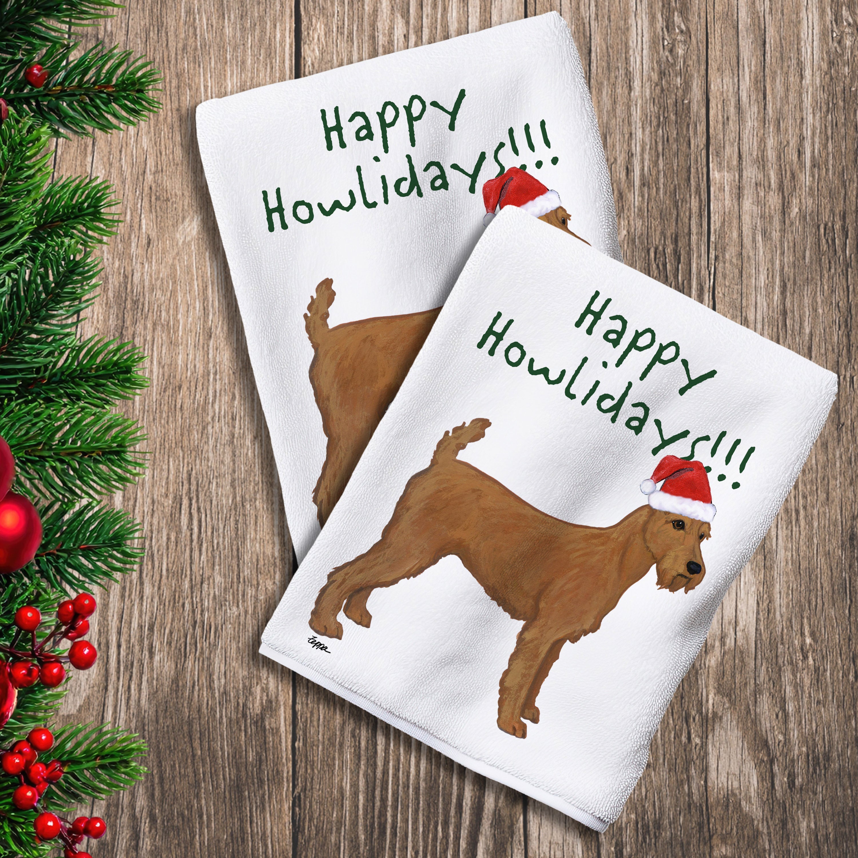 2 Kitchen Towels with an Irish Terrier in a Santa Hat and Happy Howlidays text.