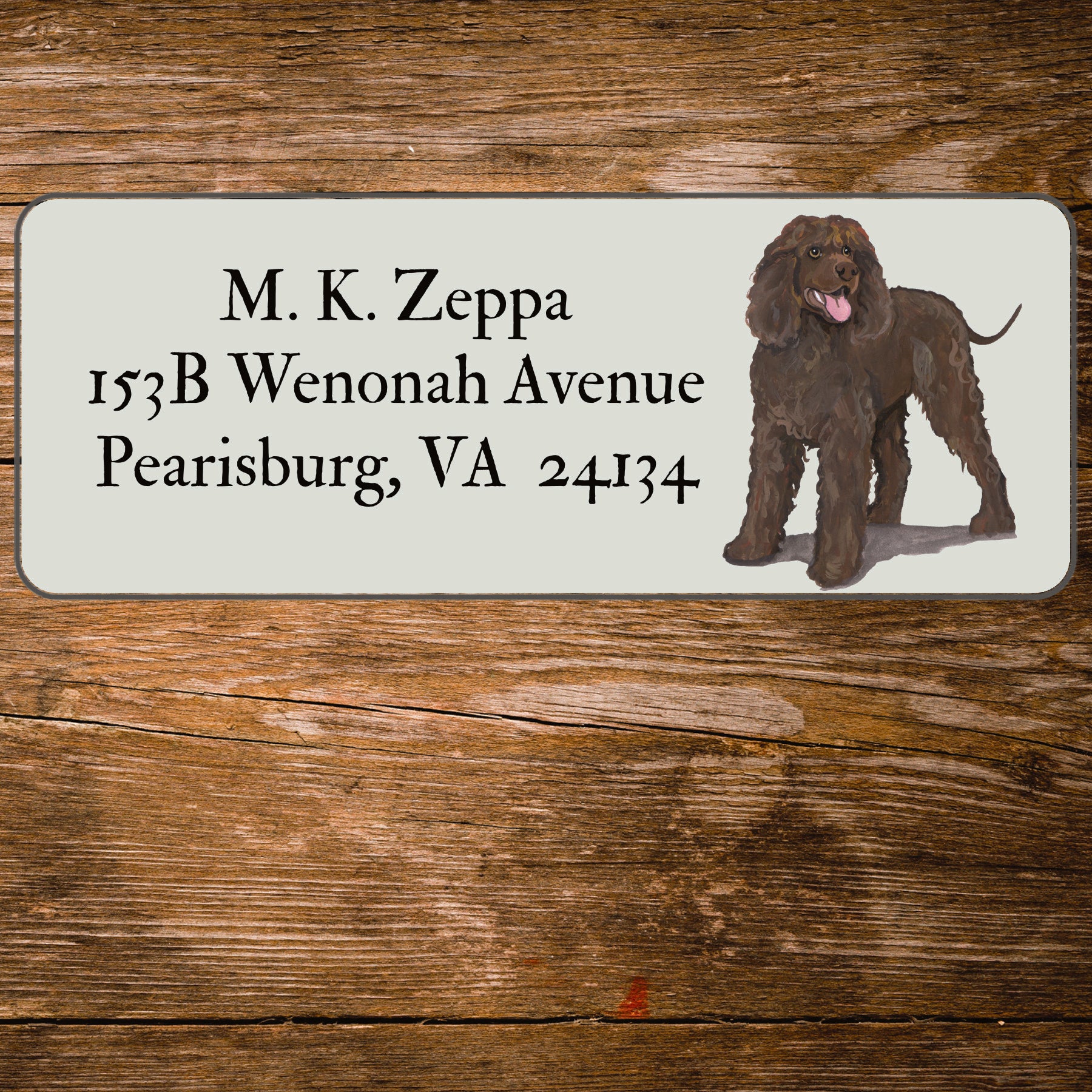 Return address label with a Irish Water Spaniel illustration.