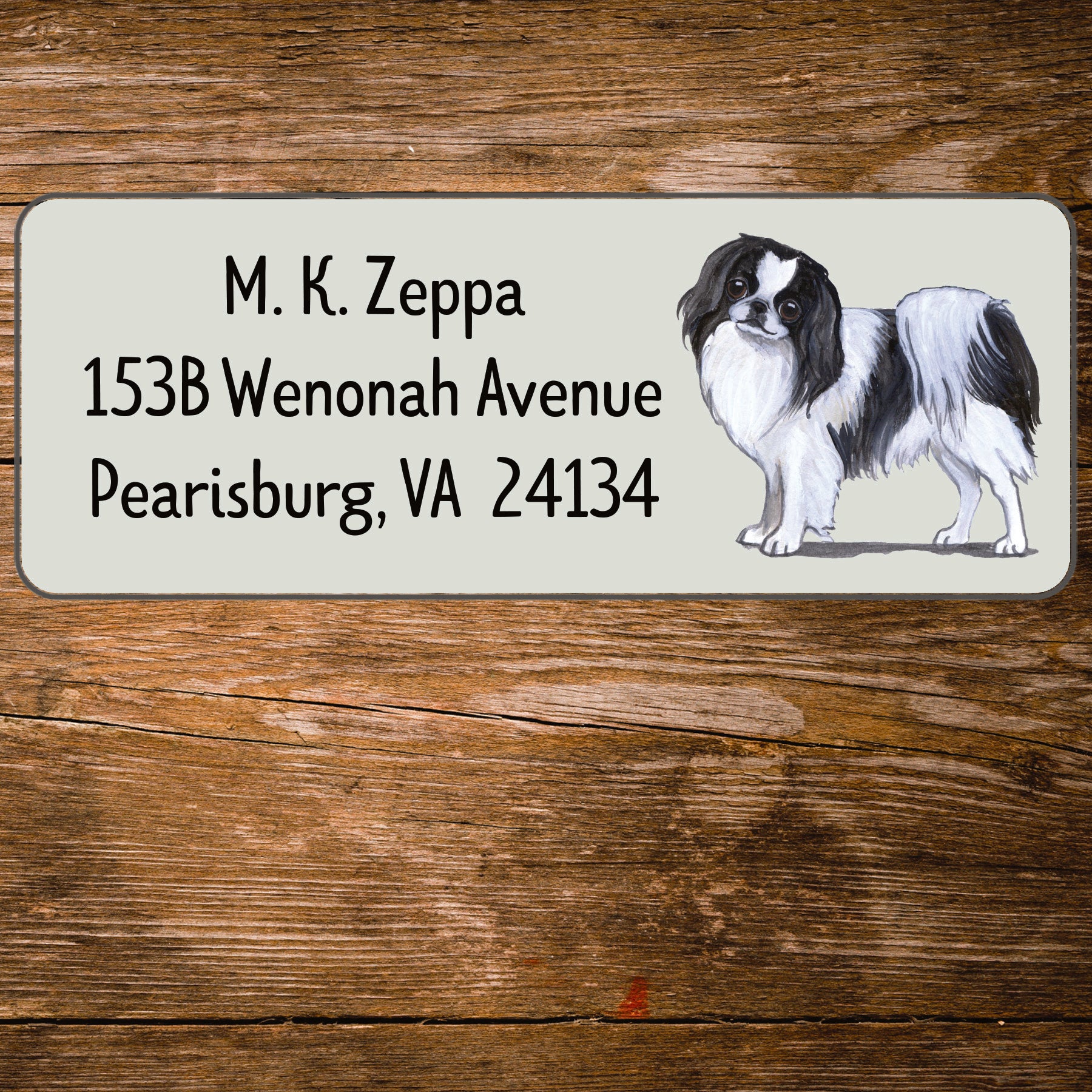 Return address label with a Japanese Chin illustration.