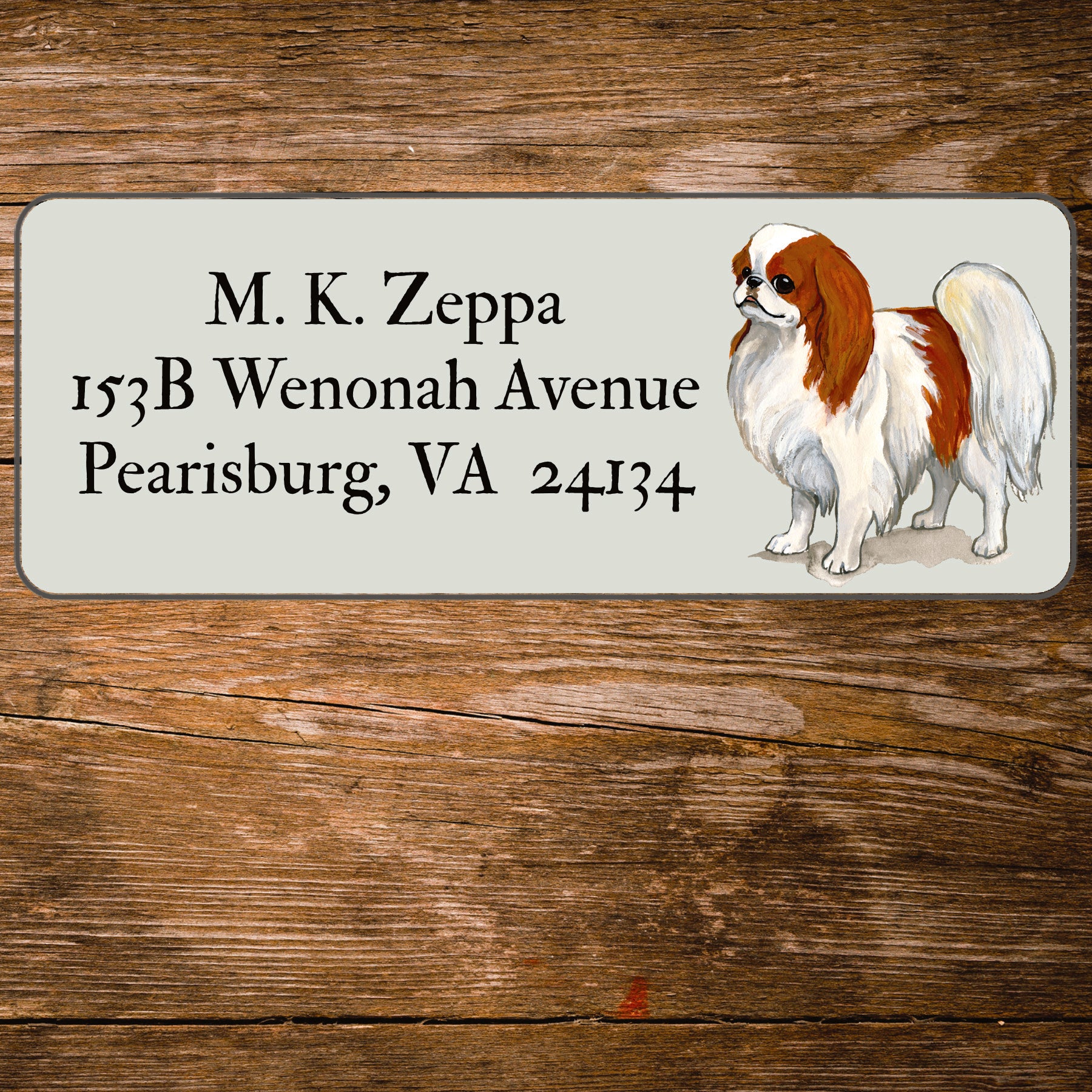 Return address label with a Japanese Chin illustration.