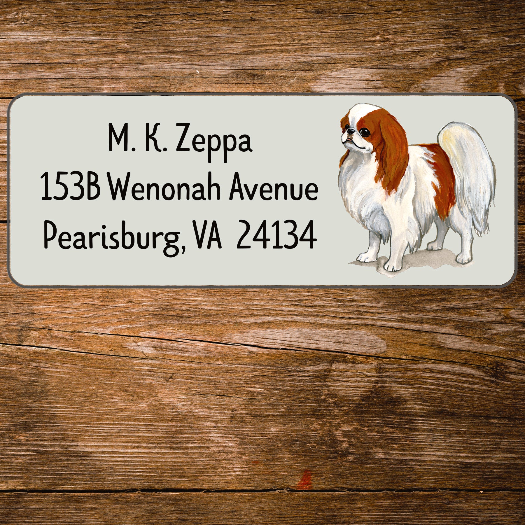 Return address label with a Japanese Chin illustration.