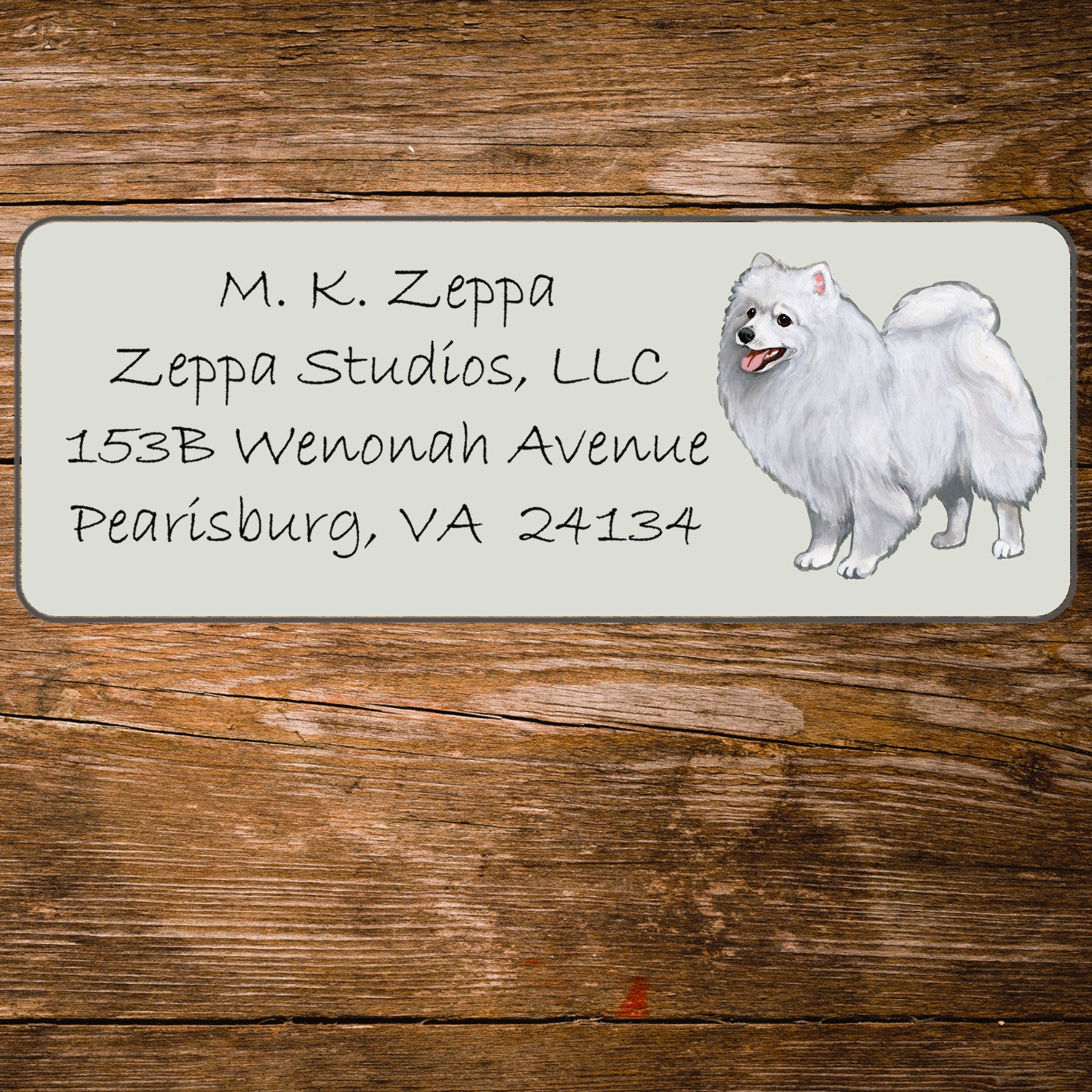 Return address label with an illustration of a Japanese Spitz