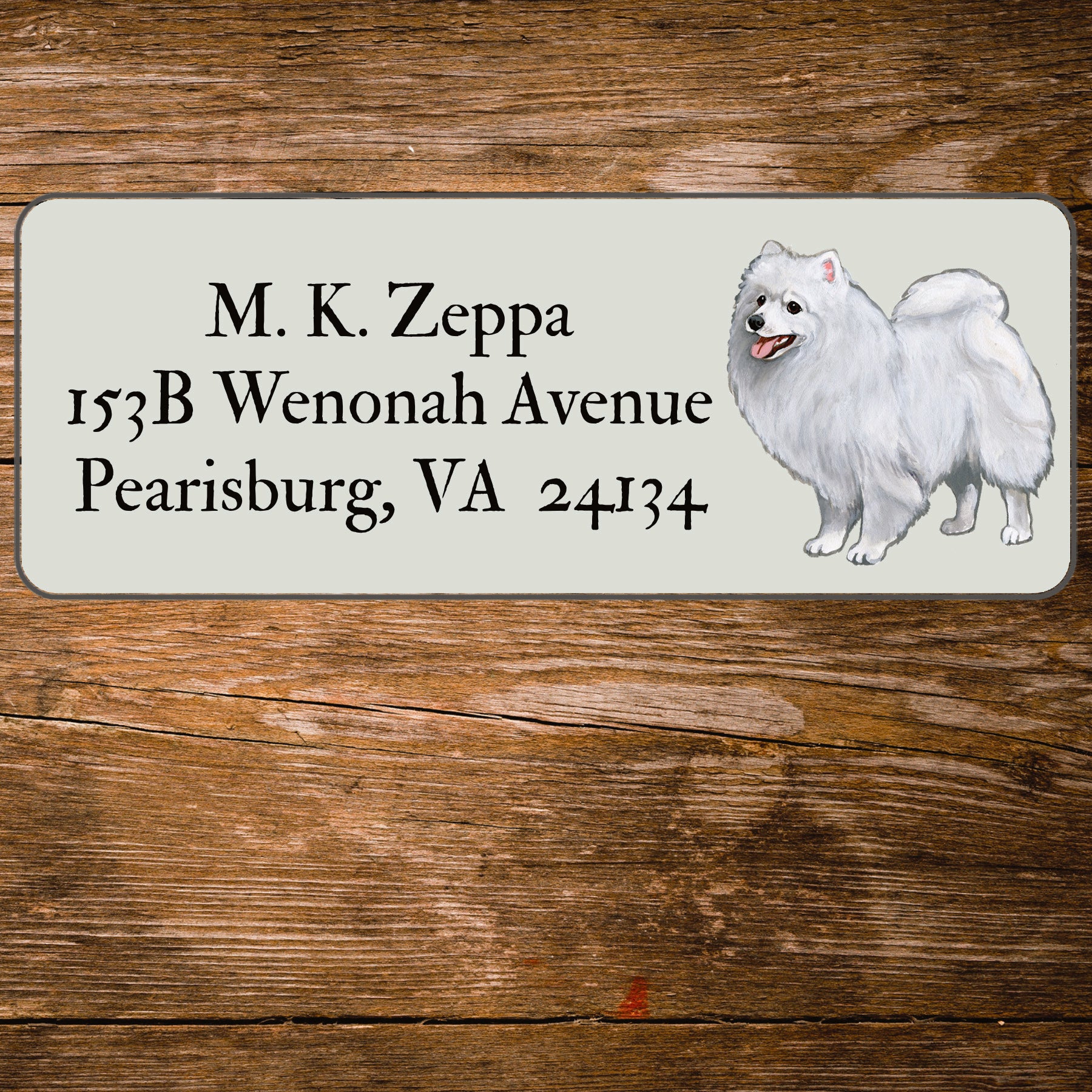 Return address label with an illustration of a Japanese Spitz
