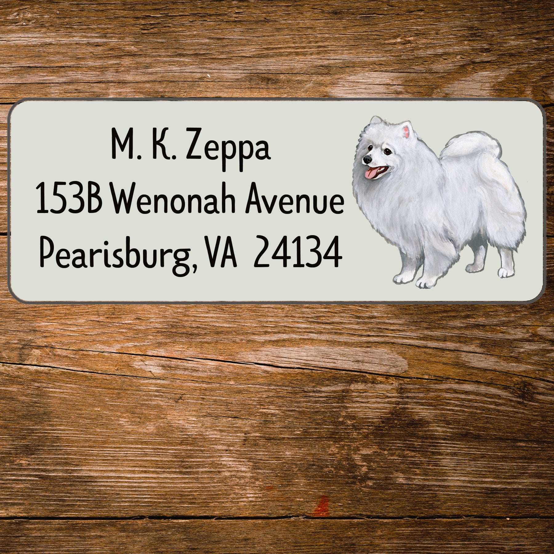 Return address label with an illustration of a Japanese Spitz