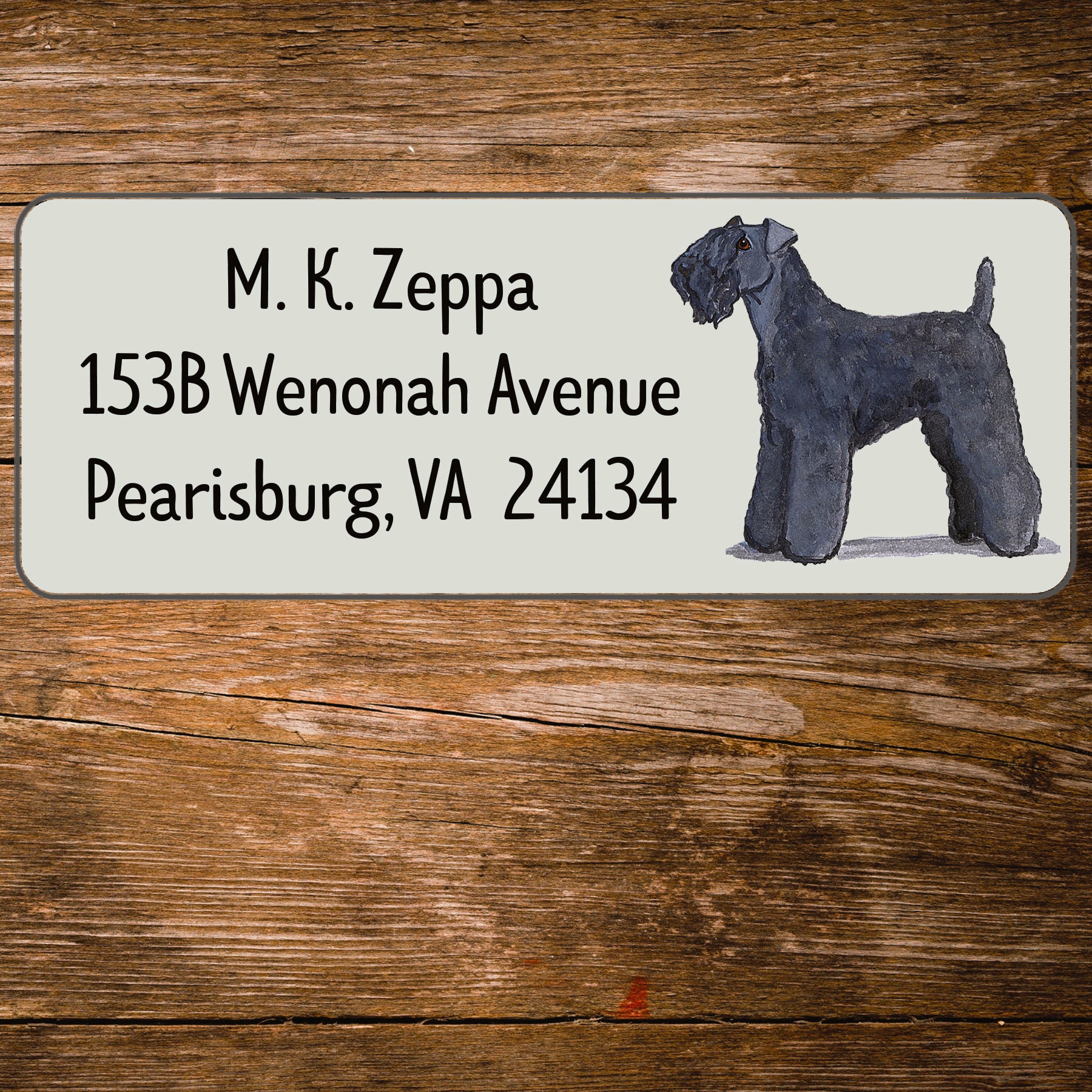 Return address label with a Kerry Blue Terrier illustration.