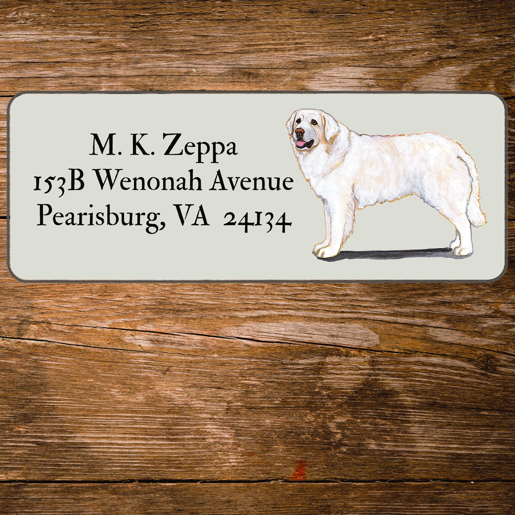 Return address label with a Kuvasz illustration.