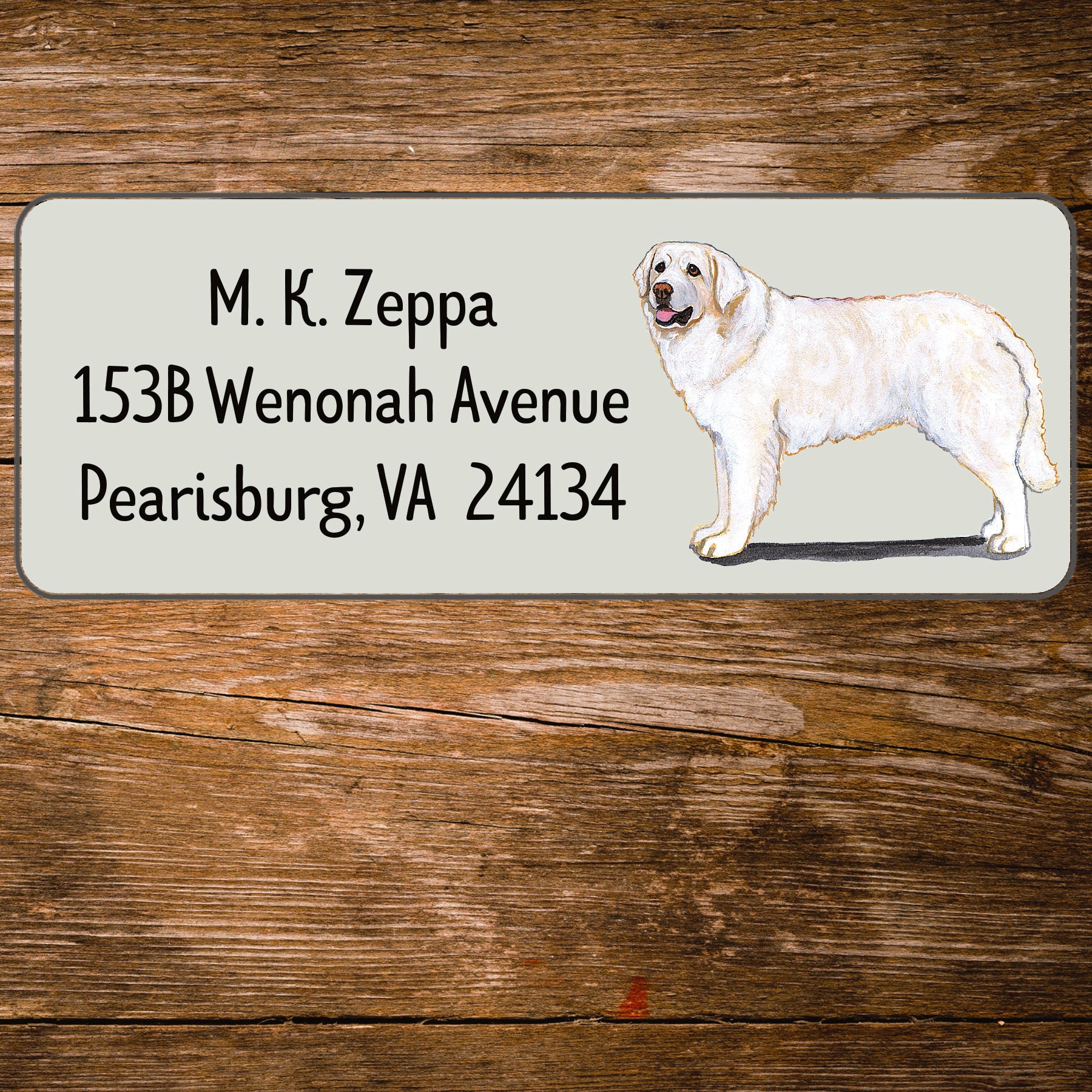 Return address label with a Kuvasz illustration.