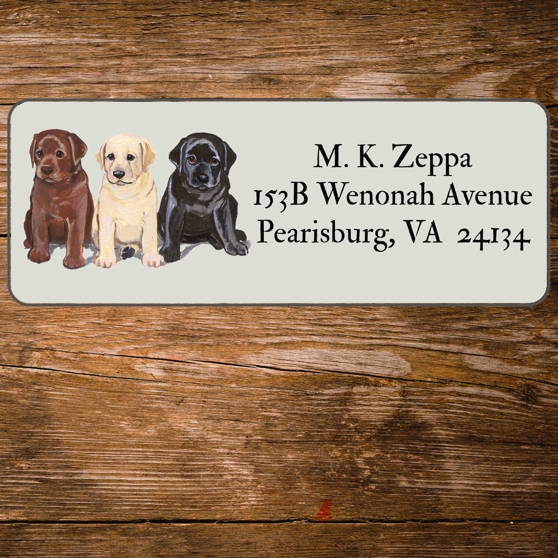 Return address label with an illustration of 3 Labrador Retriever Puppies.