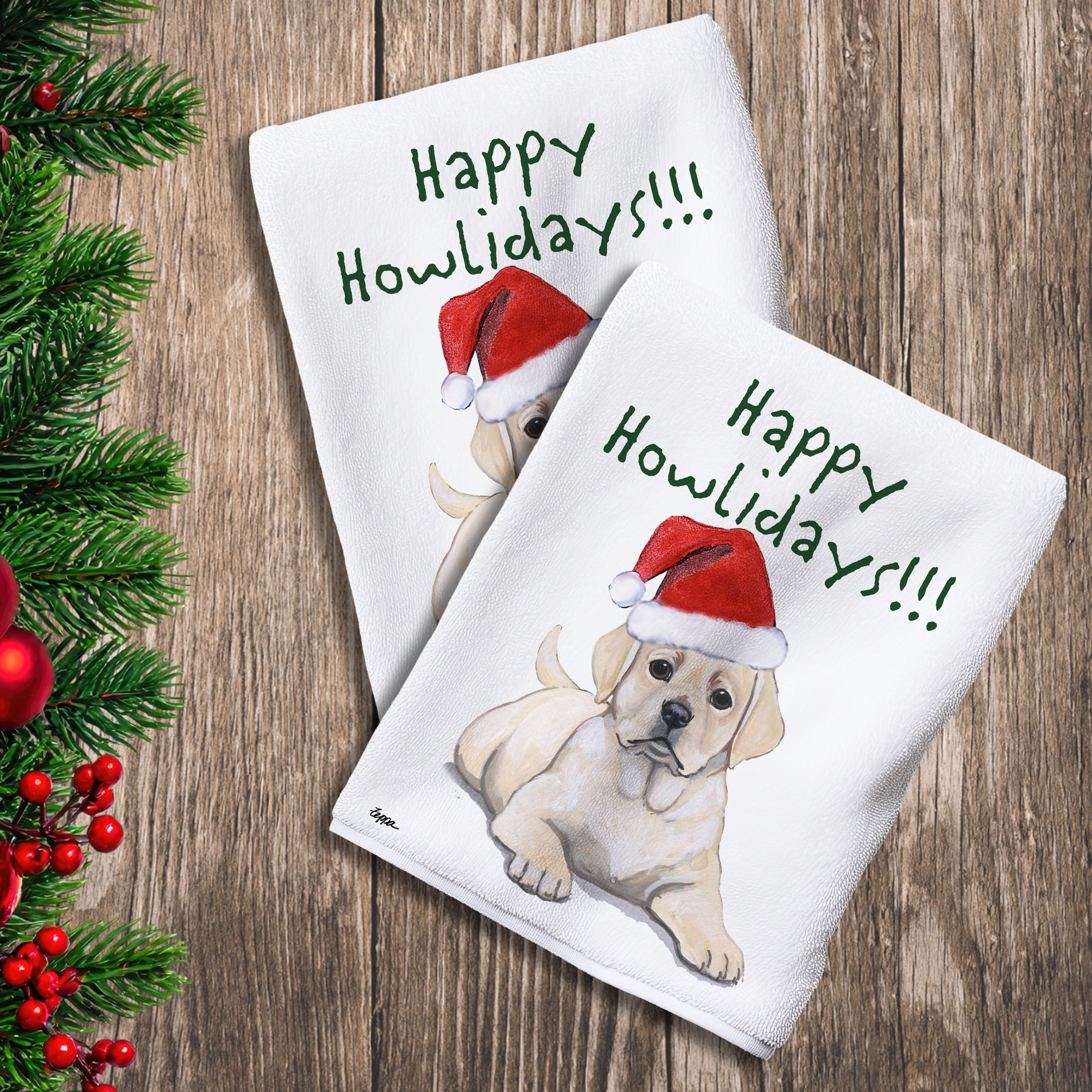 2 Kitchen Towels with a Yellow Lab puppy in a Santa Hat and Happy Howlidays text.
