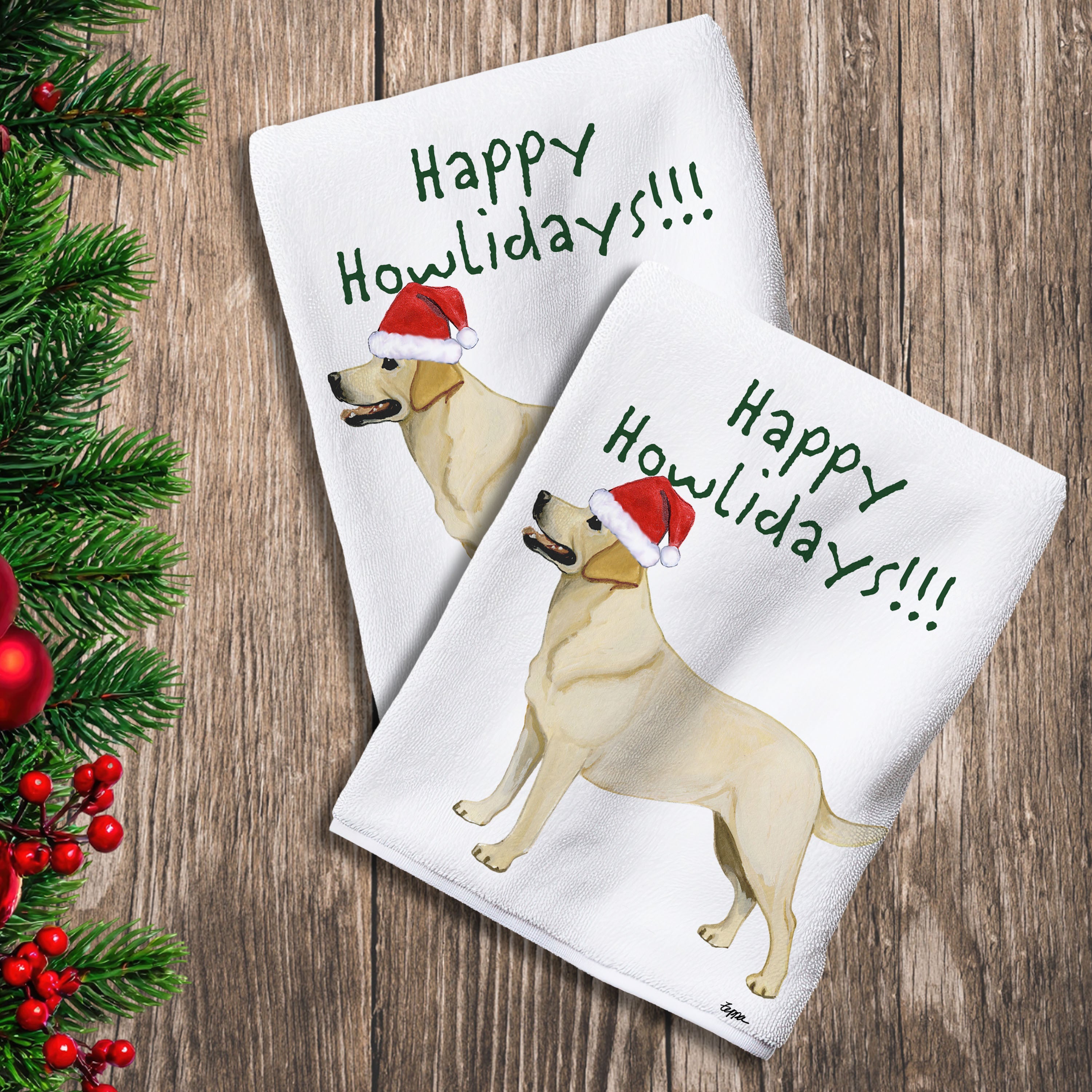 2 Kitchen Towels with a standing Yellow Lab in a Santa Hat and Happy Howlidays text.
