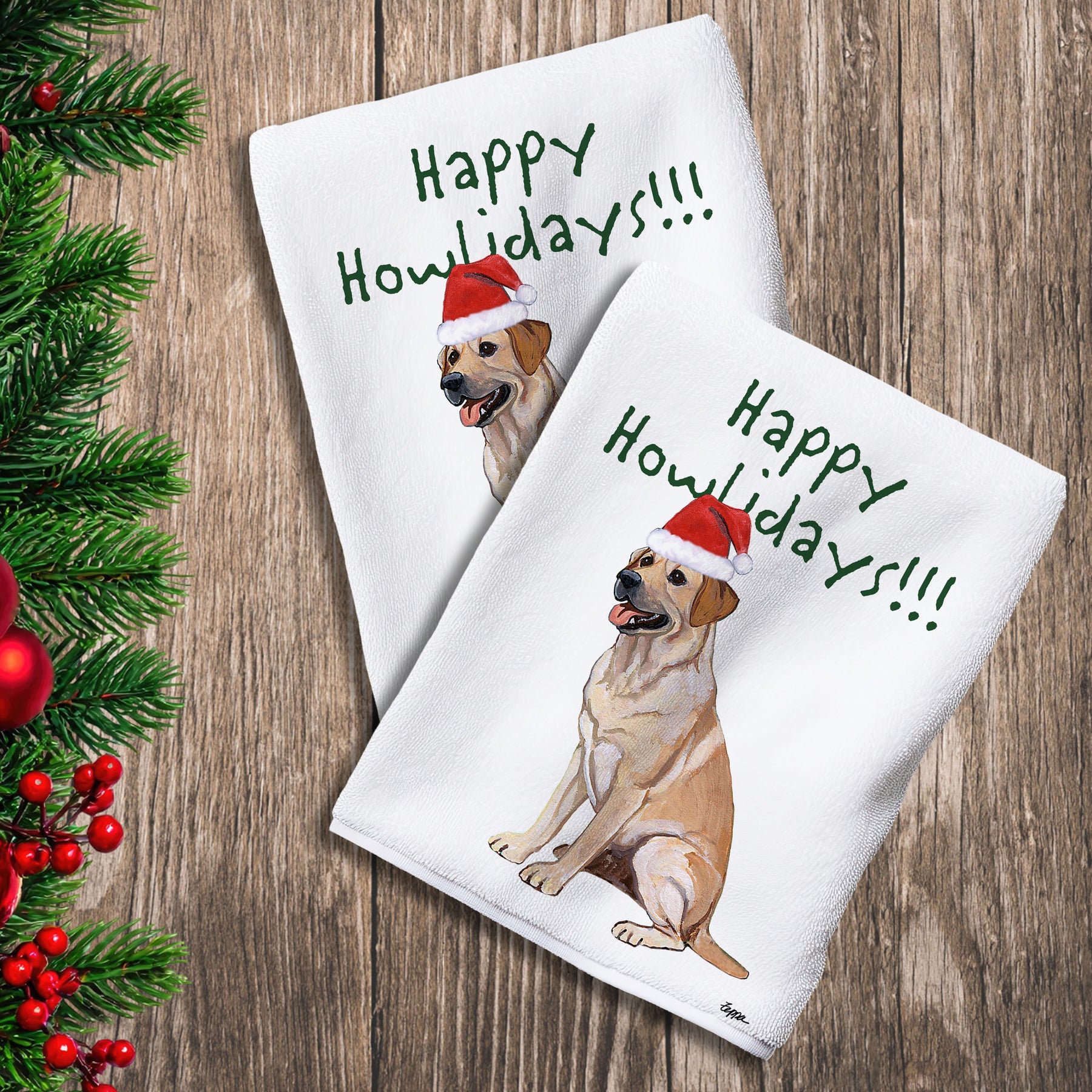 2 Kitchen Towels with a Yellow Lab in a Santa Hat and Happy Howlidays text.
