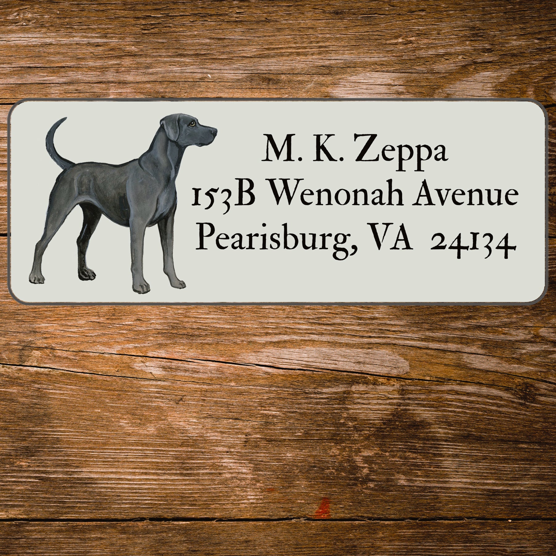 Return address label with an illustration of a Lacy Dog.