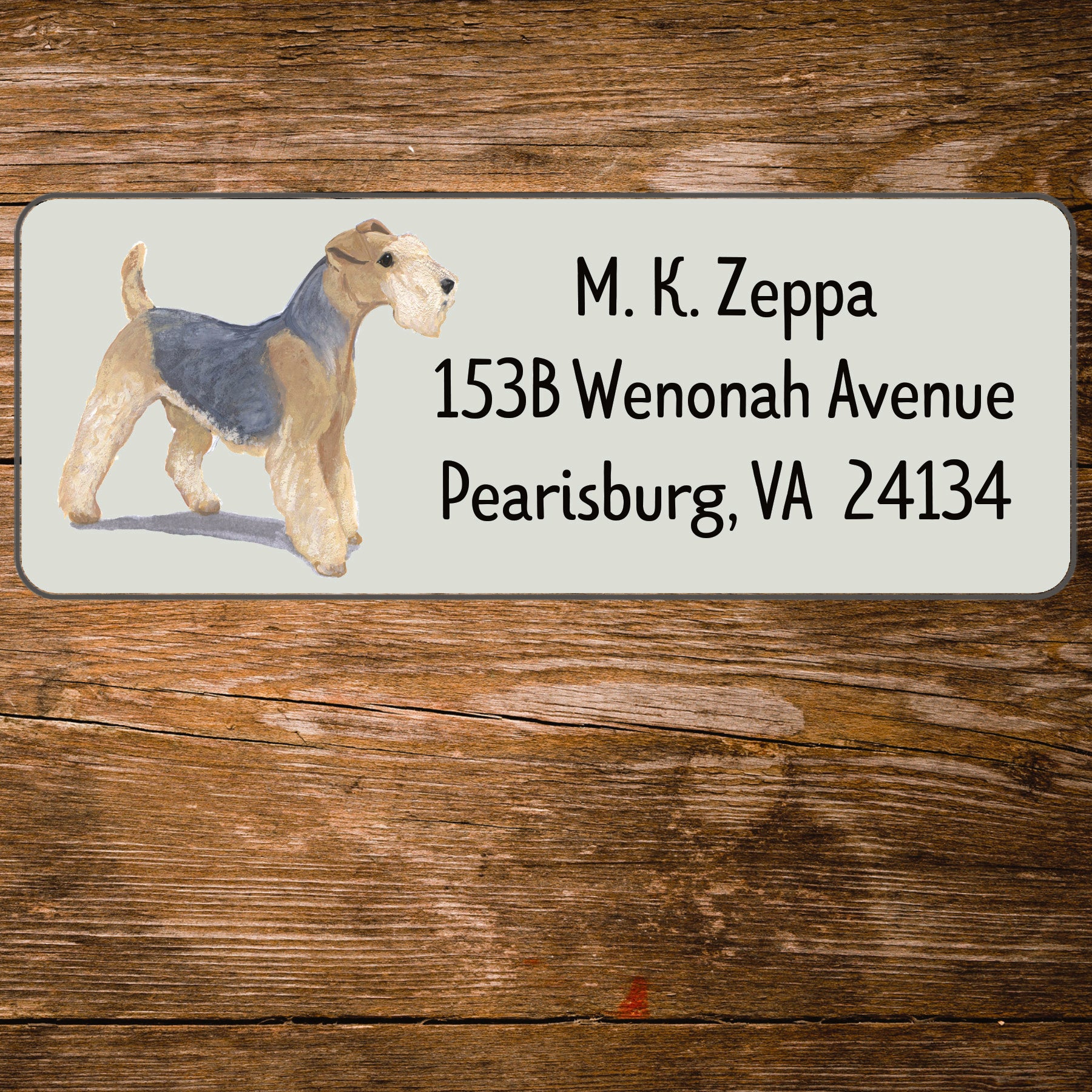 Return address label with a Lakeland Terrier illustration.