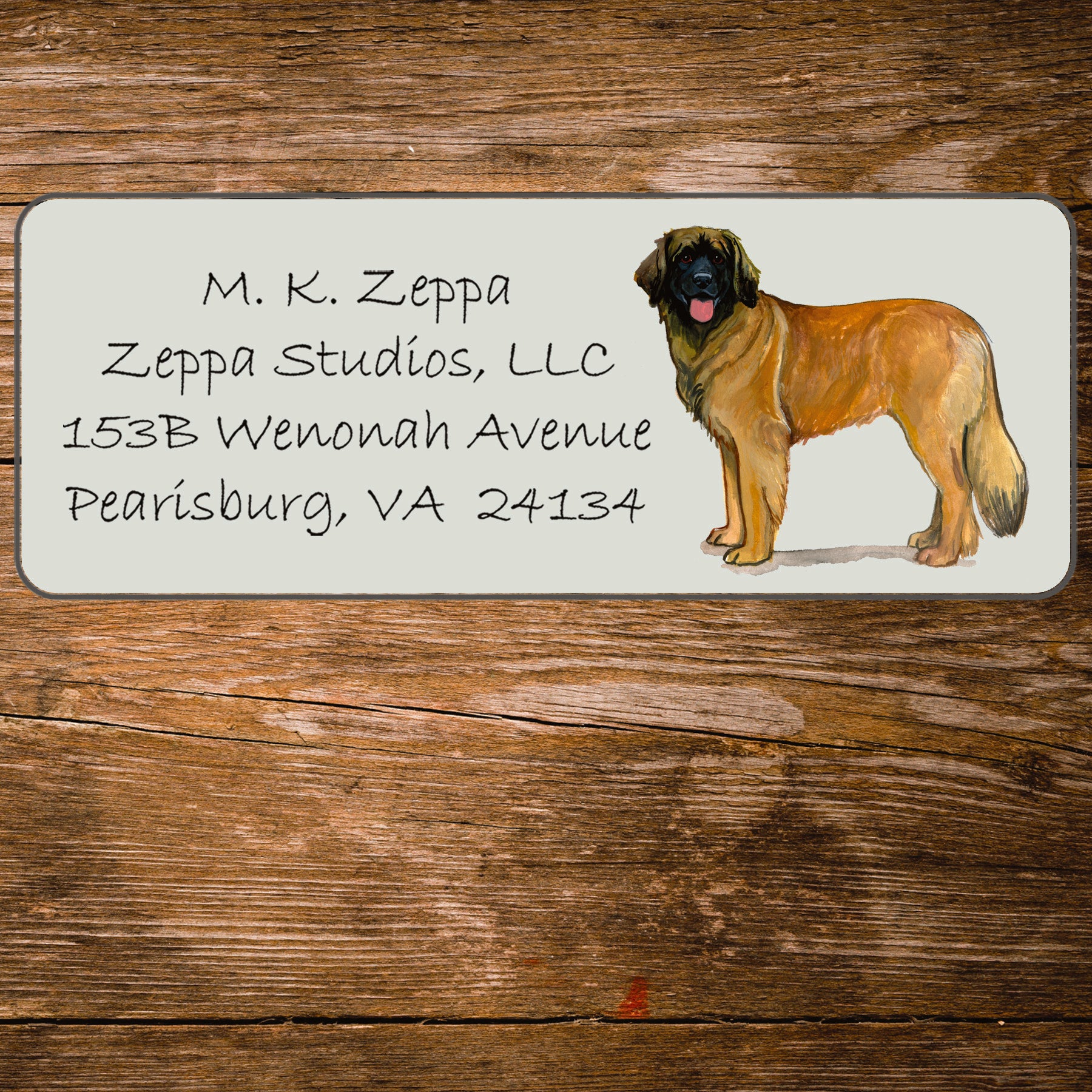 Return address label with a Leonberger illustration.