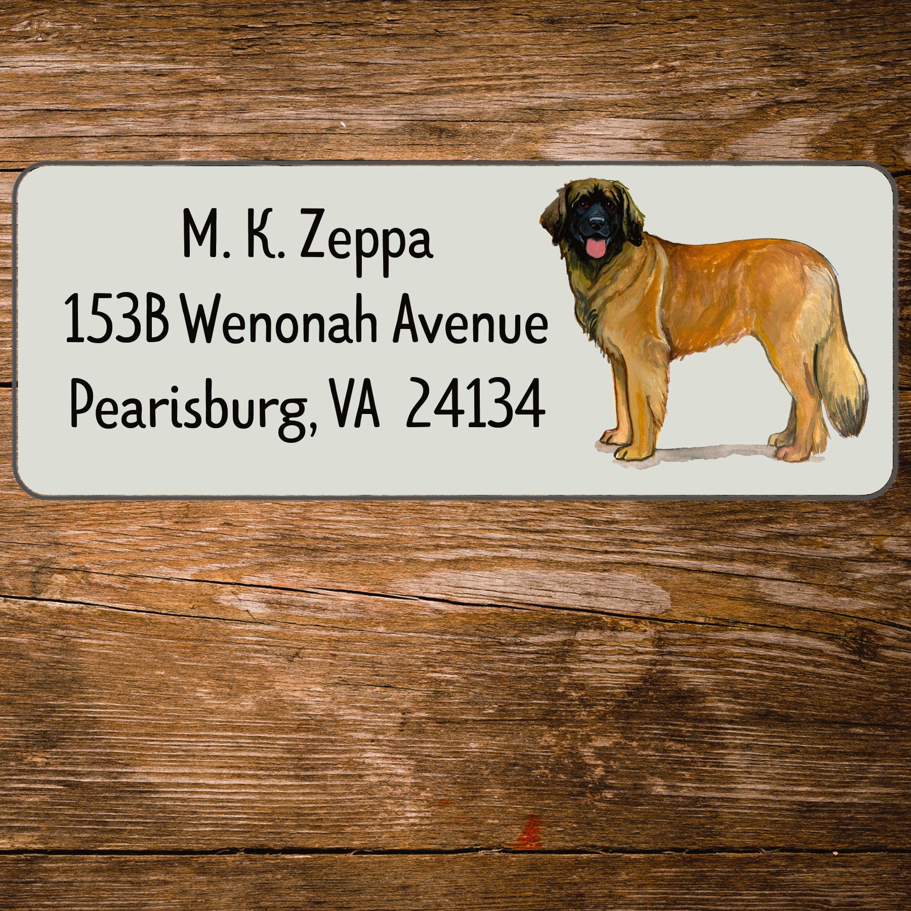 Return address label with a Leonberger illustration.