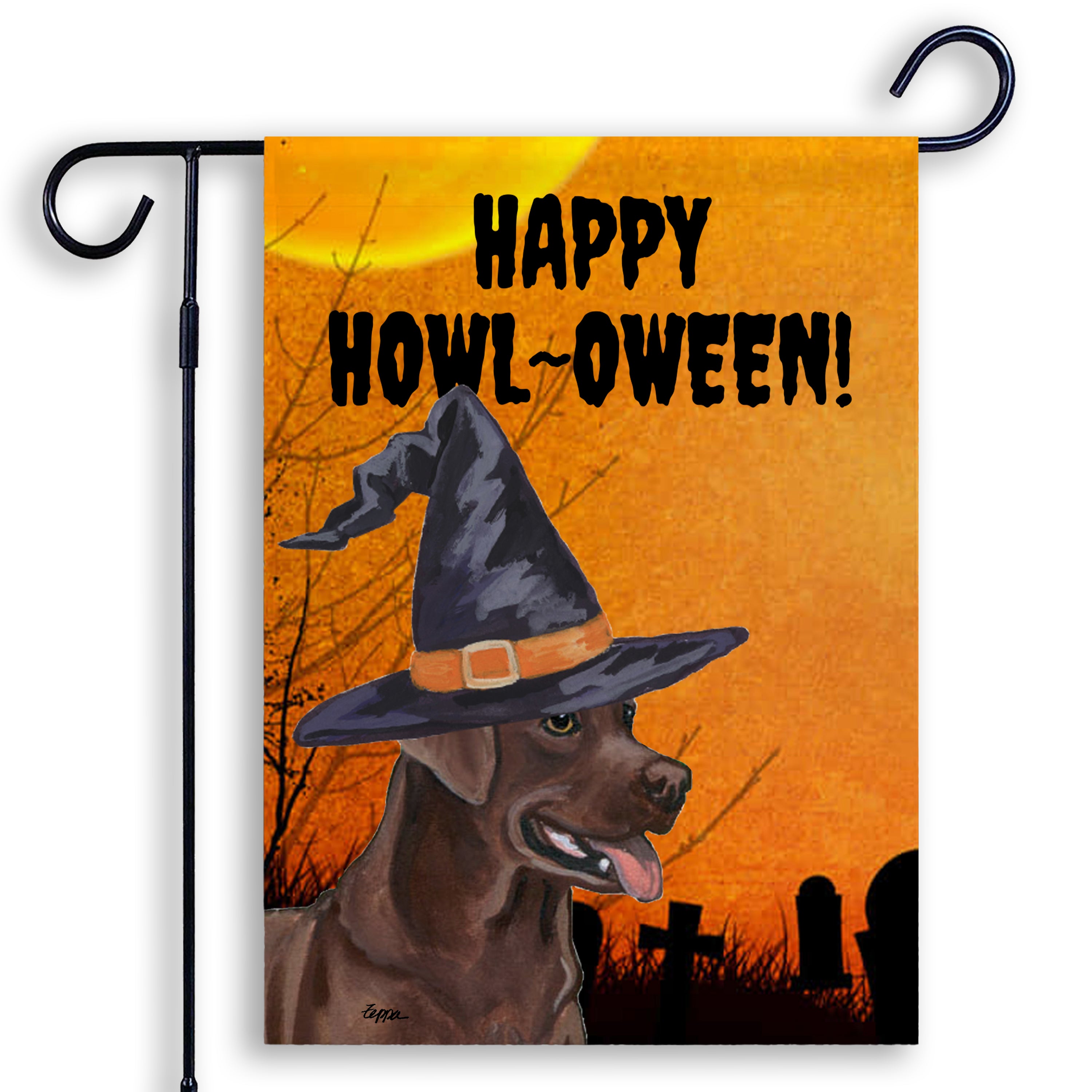 Halloween-themed garden flag with a Chocolate Labrador wearing a witch hat and 'Happy Howl-Oween!' text on an orange background.