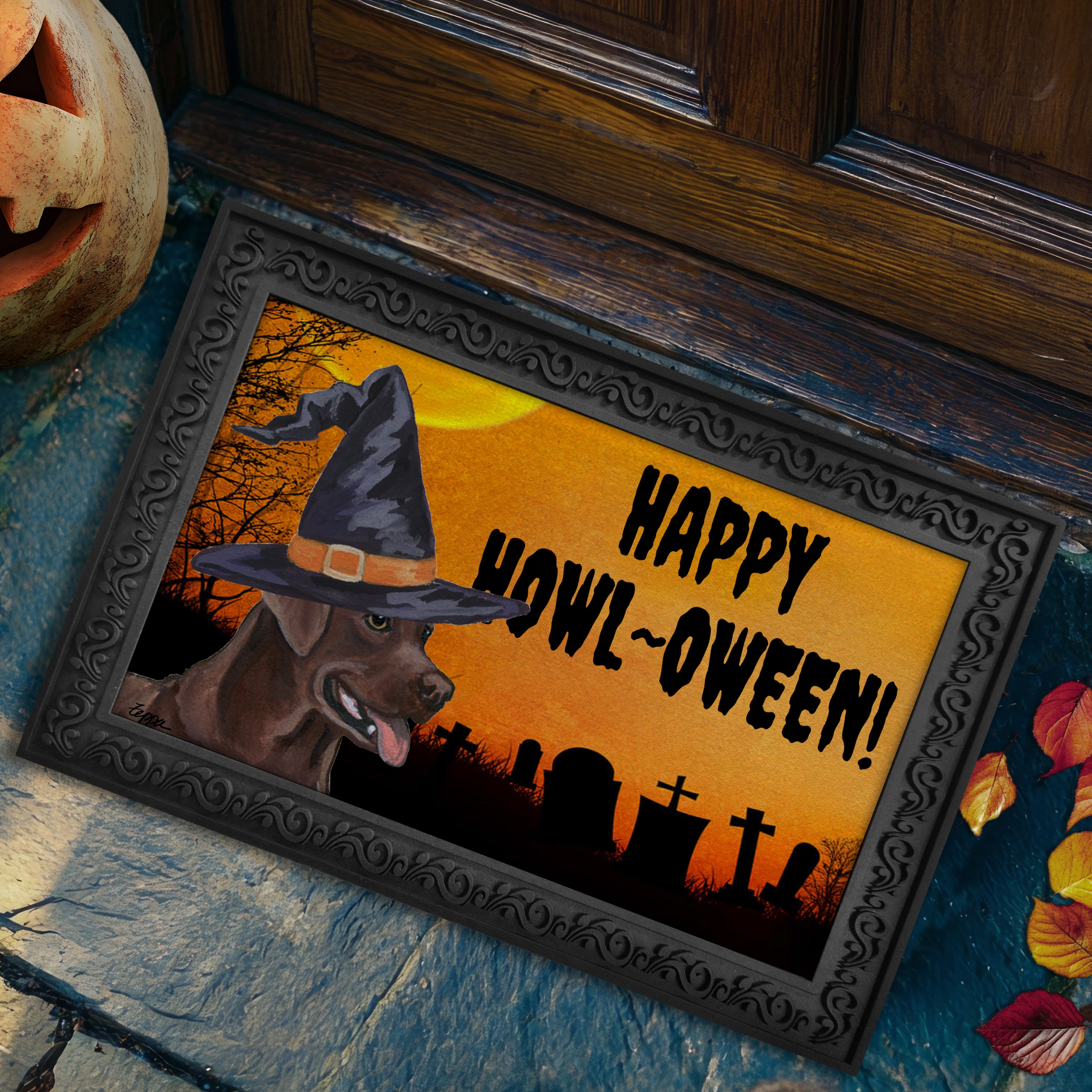Halloween-themed doormat with a Chocolate Lab wearing a witch hat and 'Happy Howl-Oween!' text, placed on a stone step.
