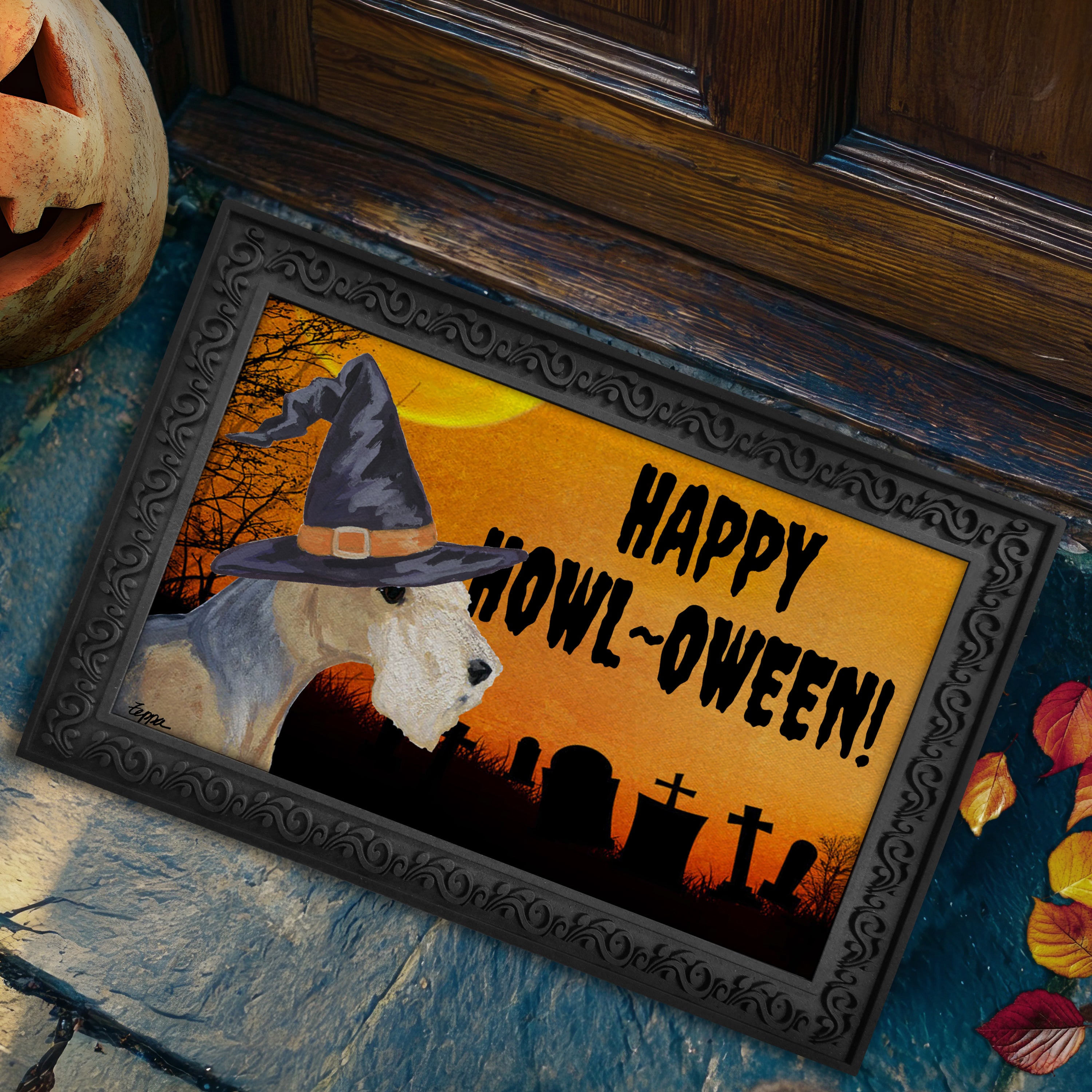 Halloween-themed doormat with a Lakeland Terrier wearing a witch hat and 'Happy Howl-Oween!' text, placed on a stone step.