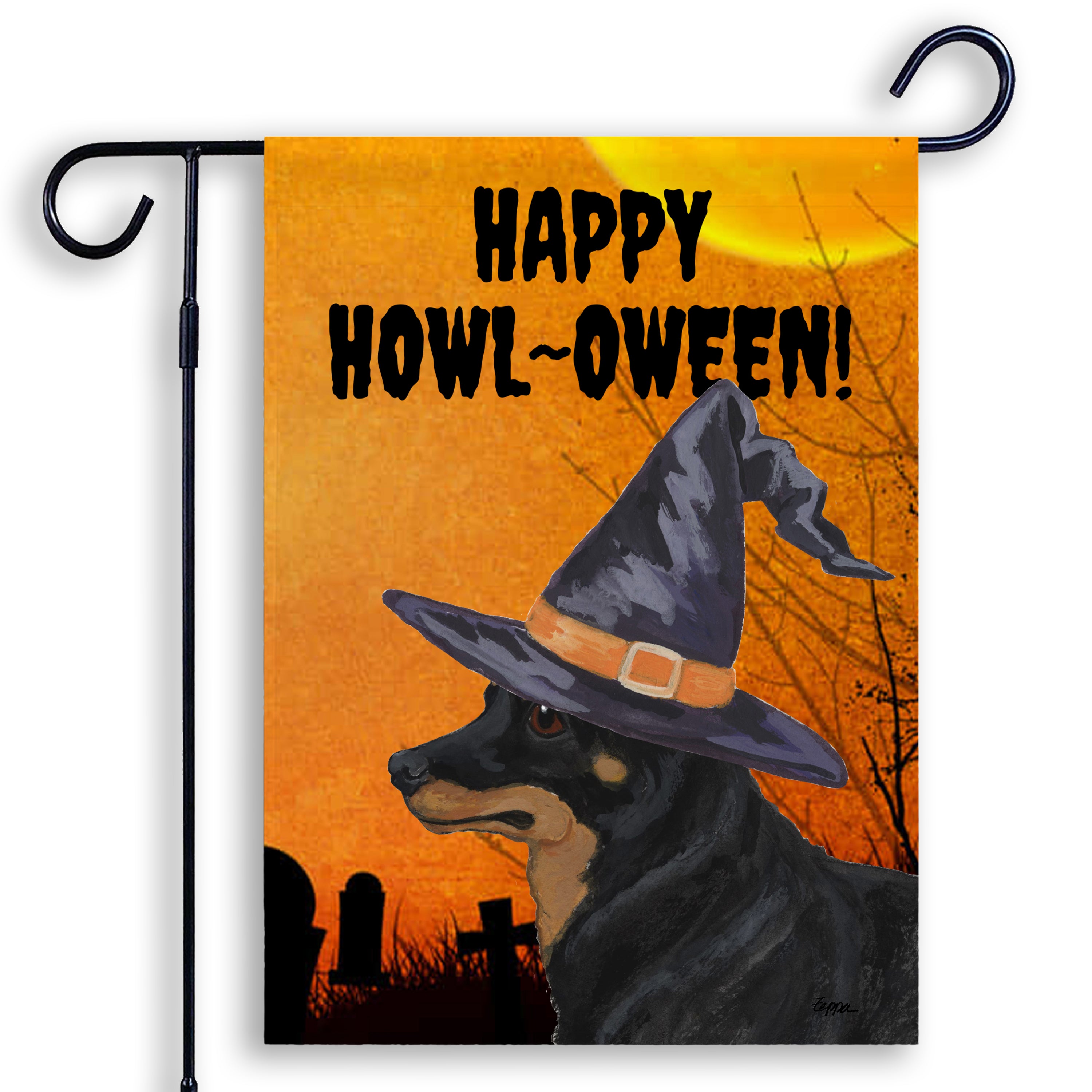 Halloween-themed garden flag with a Lancashire Heeler wearing a witch hat and 'Happy Howl-Oween!' text on an orange background.