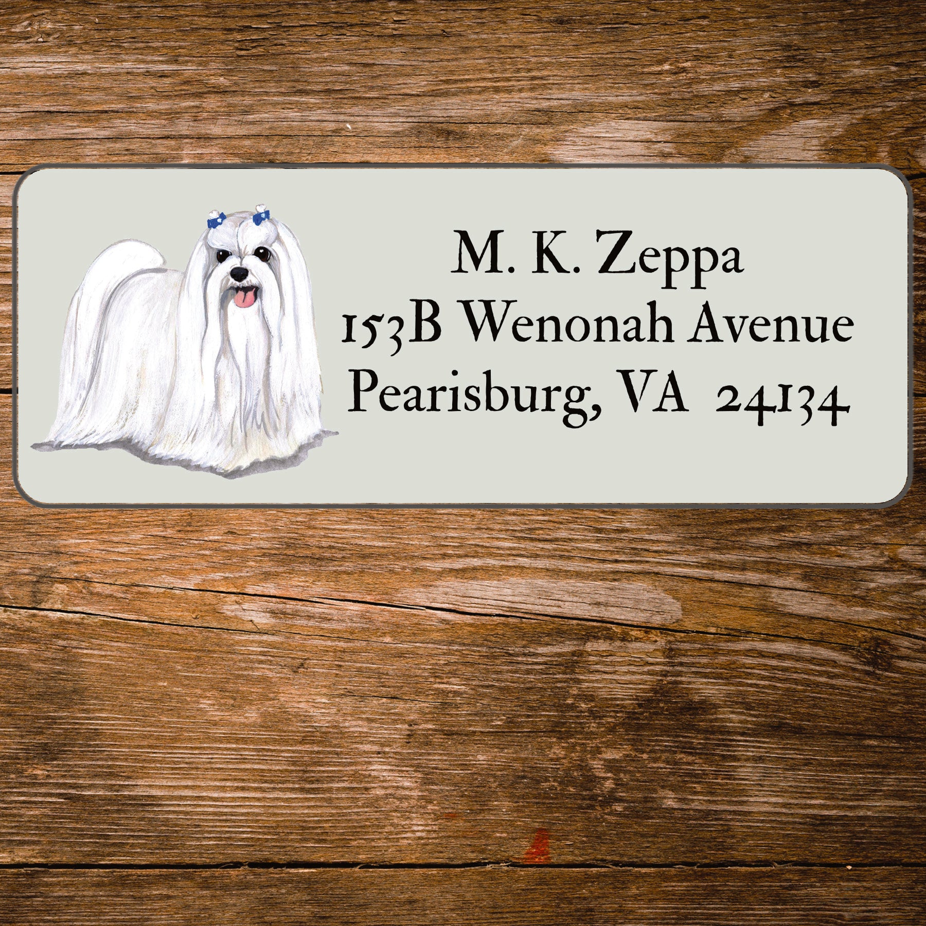 Return address label with a Maltese dog illustration.