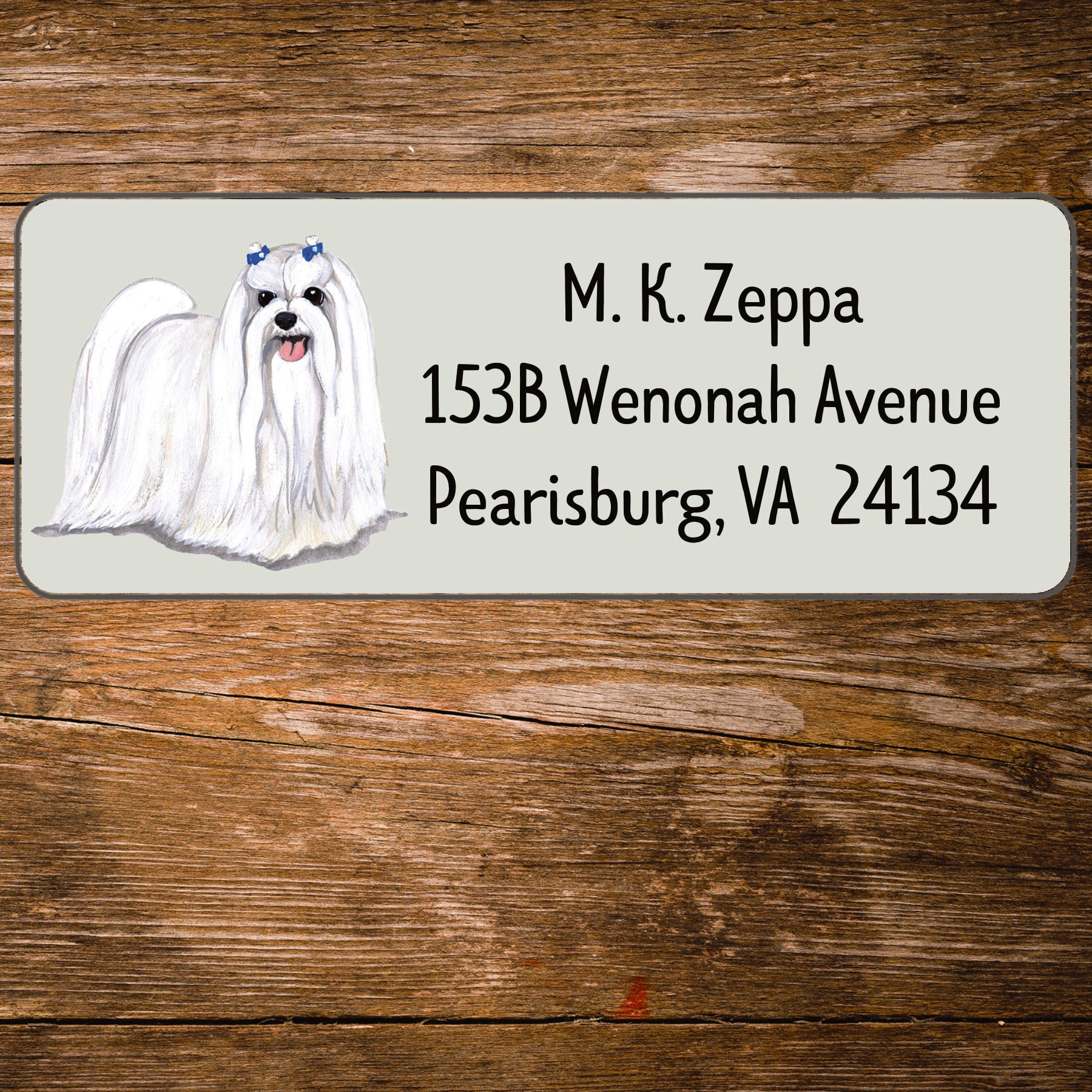 Return address label with a Maltese dog illustration.