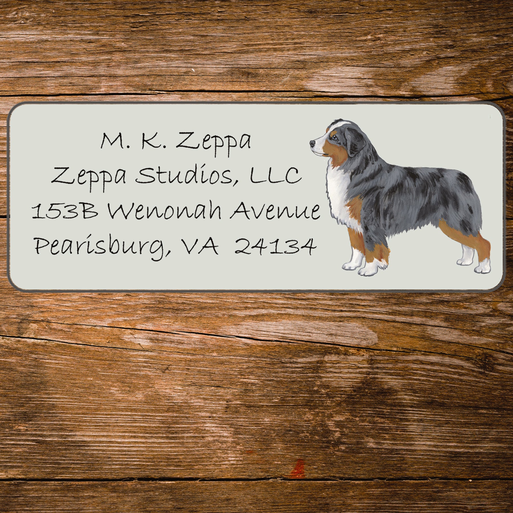 Return address label with an illustration of a Miniature American Shepherd