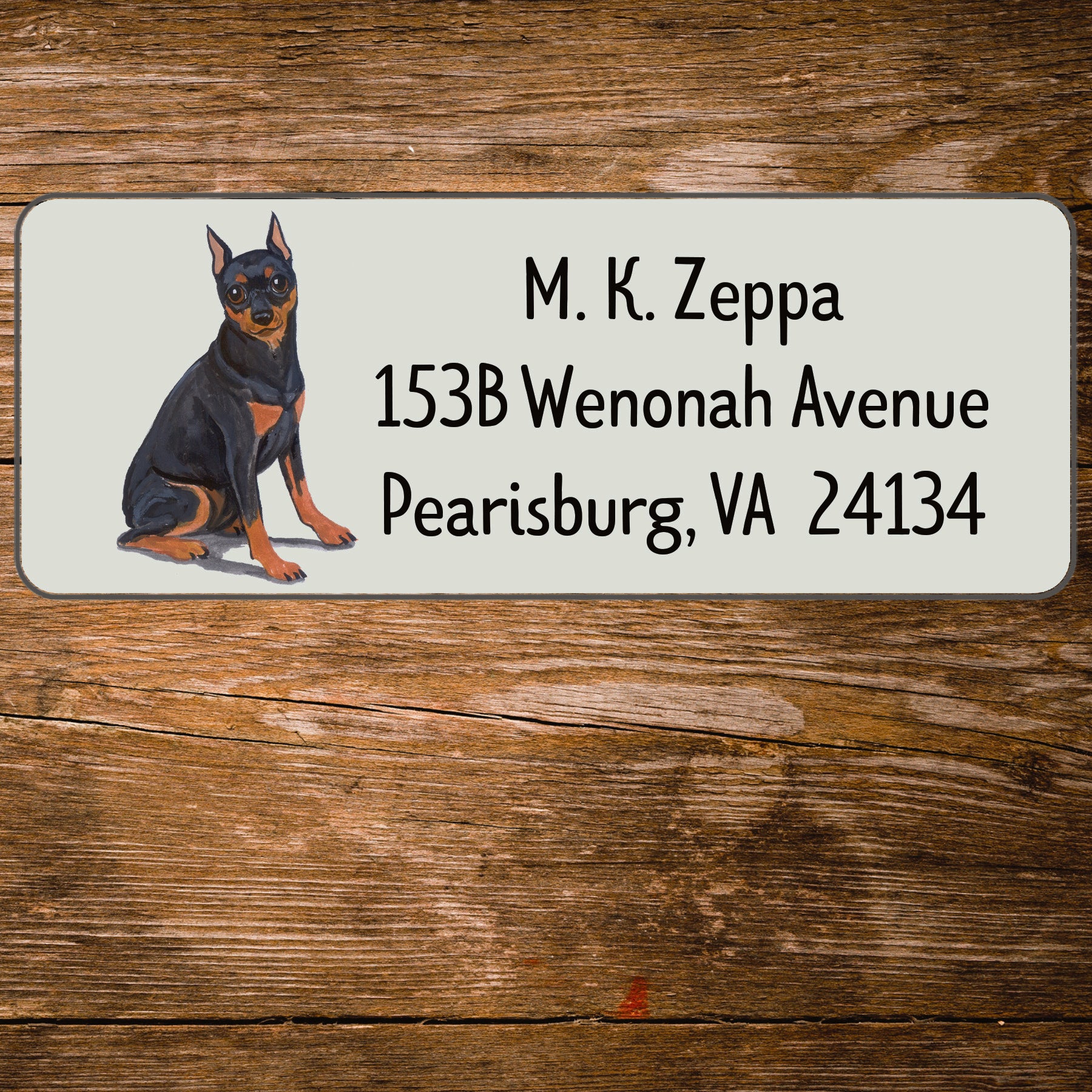 Return address label with a Miniature Pinscher illustration.