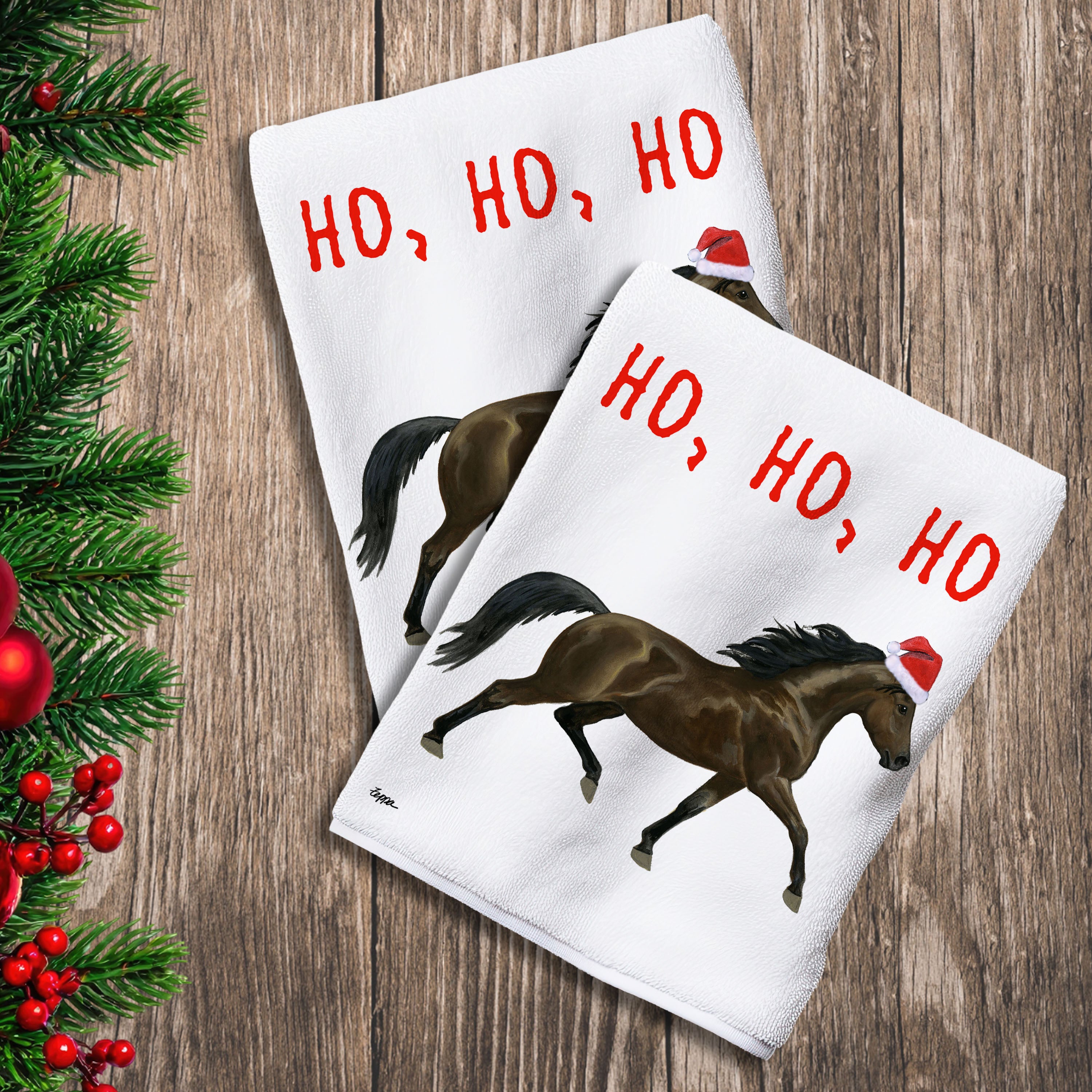 2 Kitchen Towels with a Morgan horse in a Santa Hat and Ho Ho Ho text.

