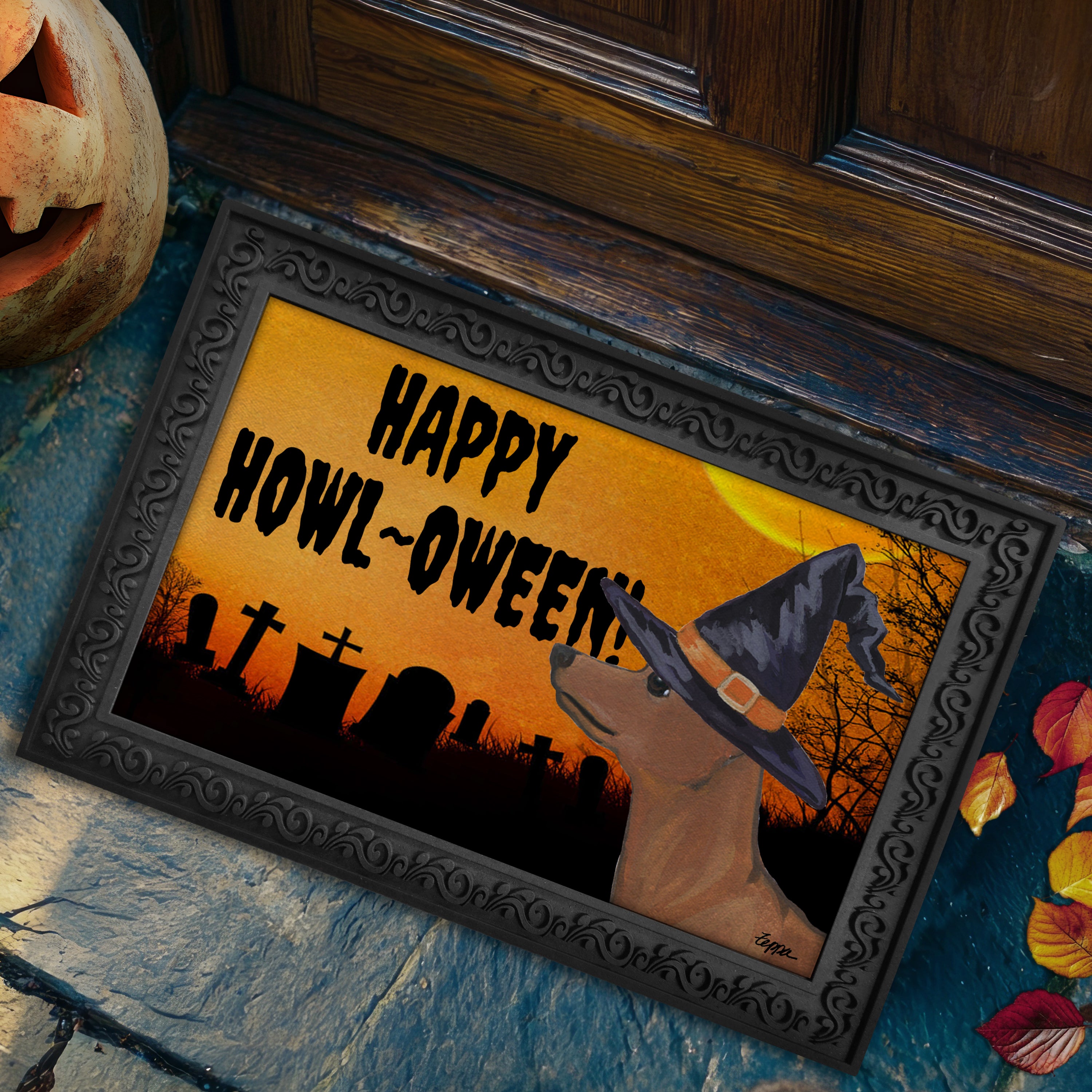 Halloween-themed doormat with a Miniature Pinscher wearing a witch hat and 'Happy Howl-Oween!' text, placed on a stone step.