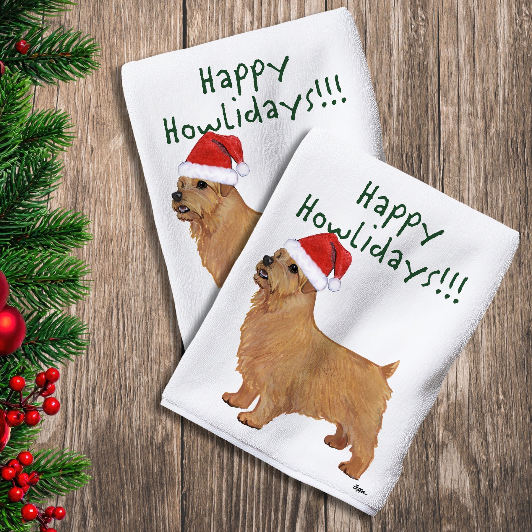 2 Kitchen Towels with a Norfolk Terrier in a Santa Hat and Happy Howlidays text.

