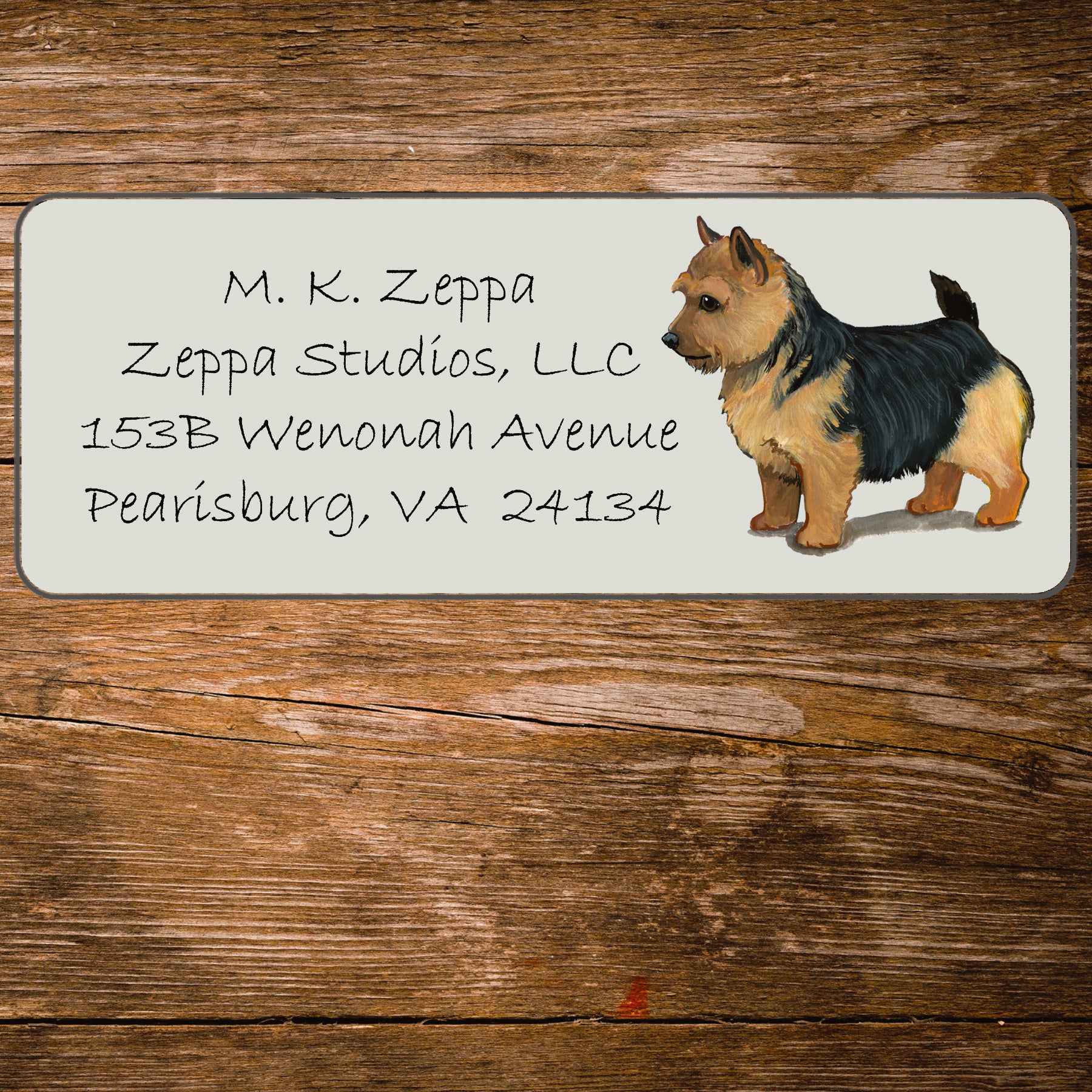 Return address label with a Norwich Terrier illustration.