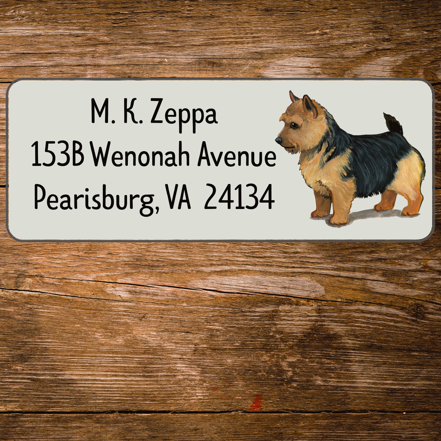 Return address label with a Norwich Terrier illustration.