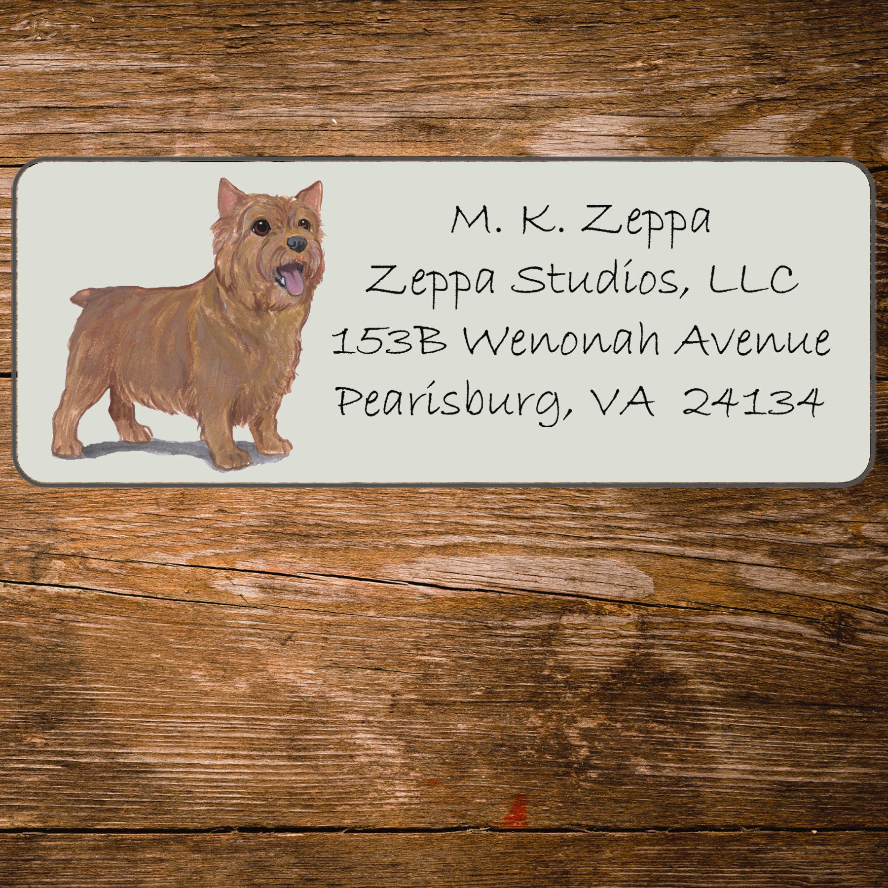 Return address label with a Norwich Terrier illustration.