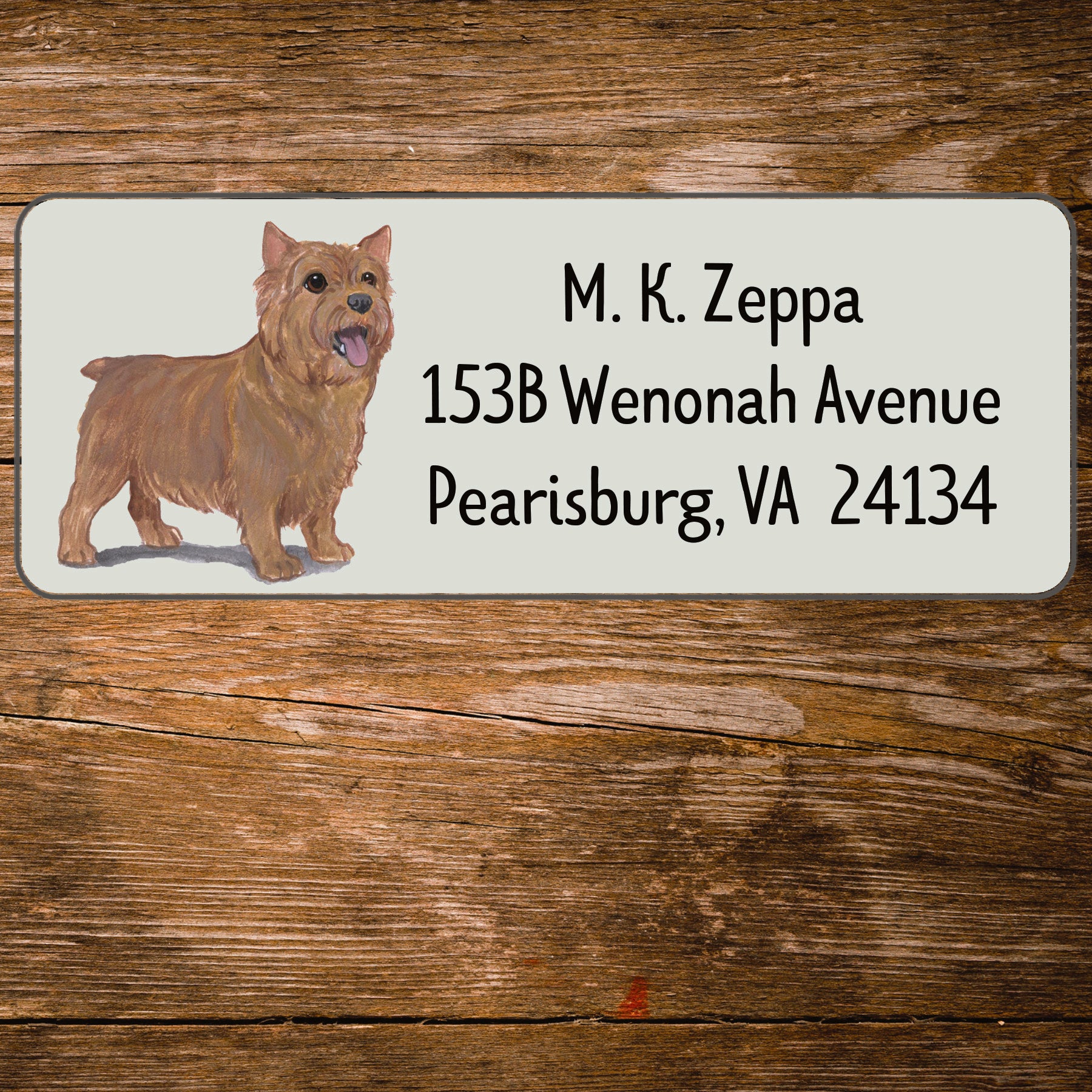 Return address label with a Norwich Terrier illustration.