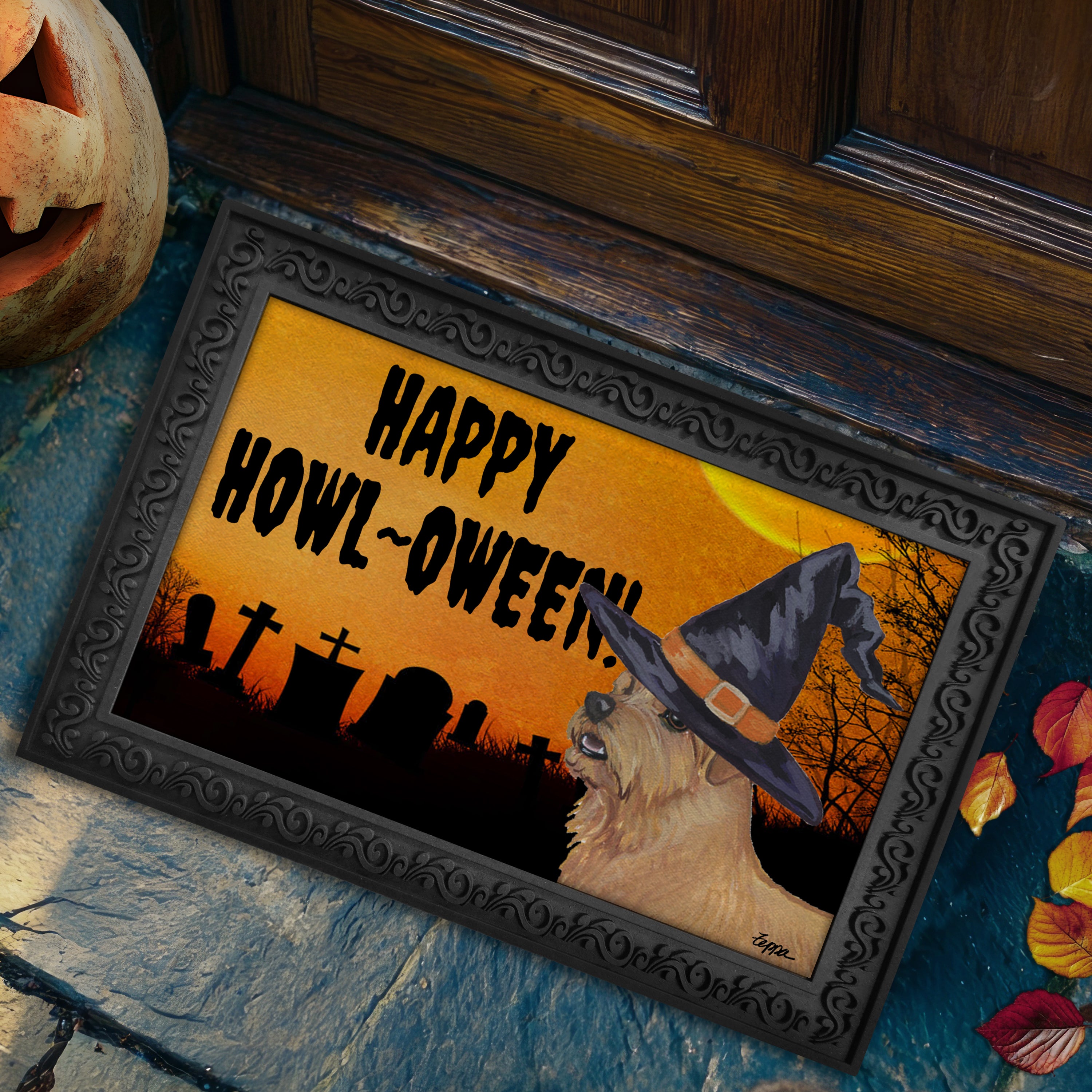 Halloween-themed doormat with a Norfolk Terrier wearing a witch hat and 'Happy Howl-Oween!' text, placed on a stone step.