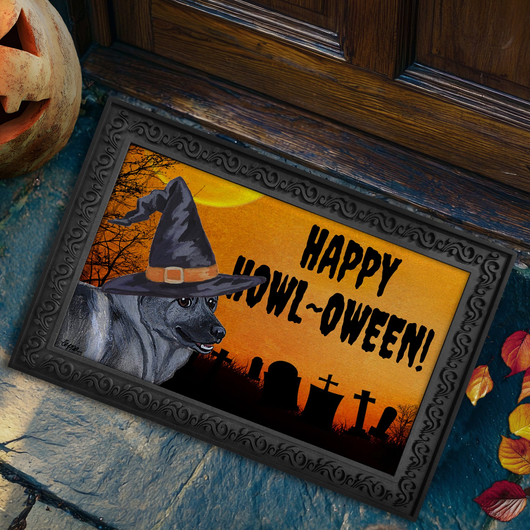 Halloween-themed doormat with a Norwegian Elkhound wearing a witch hat and 'Happy Howl-Oween!' text, placed on a stone step.