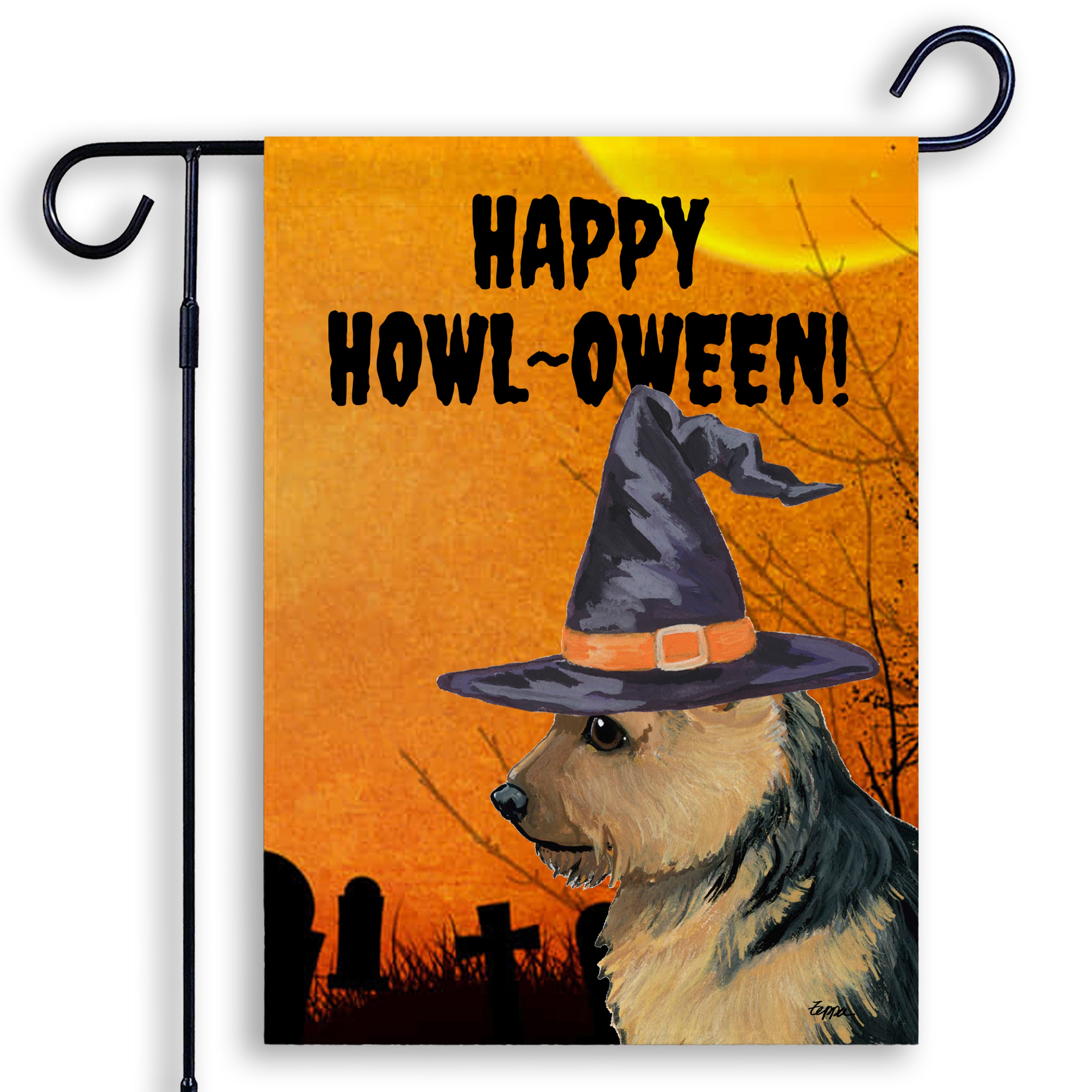 Halloween-themed garden flag with a Norwich Terrier wearing a witch hat and 'Happy Howl-Oween!' text on an orange background.