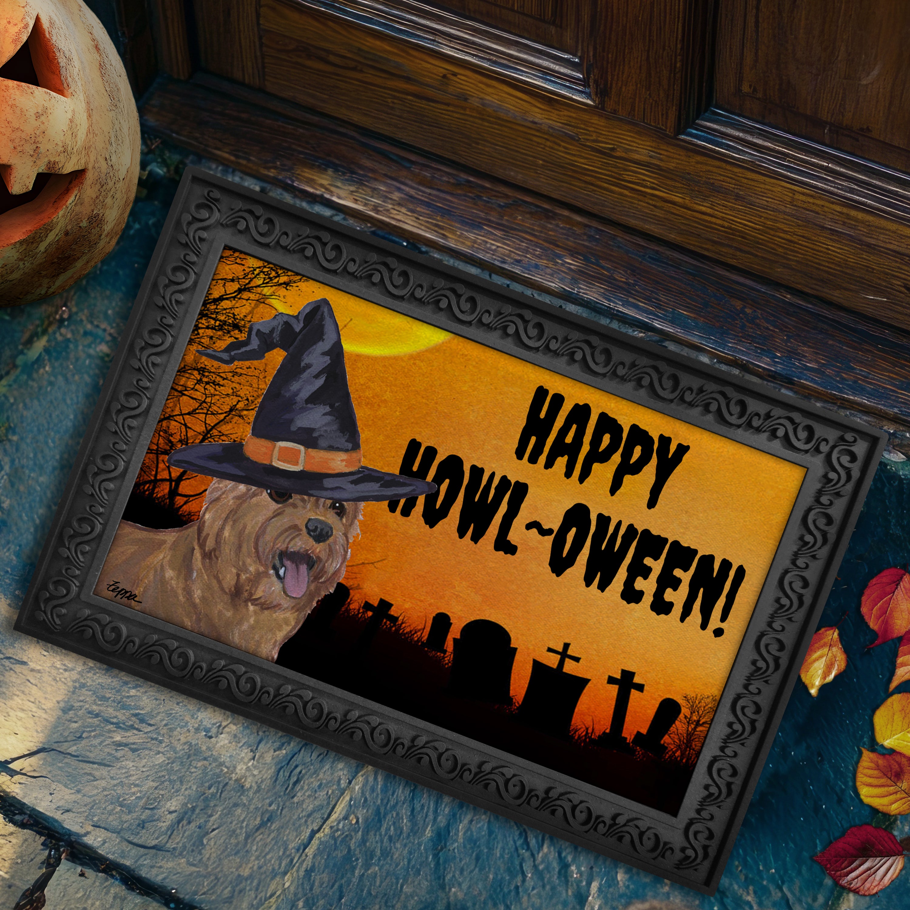 Halloween-themed doormat with a Norwich Terrier wearing a witch hat and 'Happy Howl-Oween!' text, placed on a stone step.