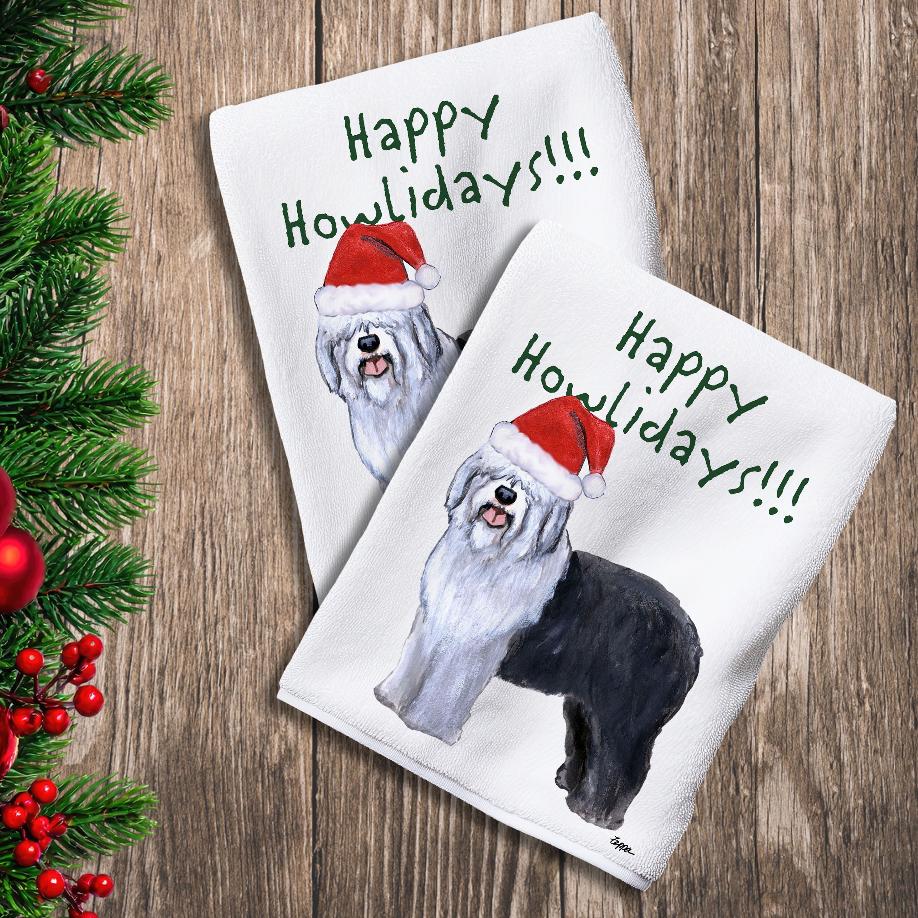 2 Kitchen Towels with an Old English Sheepdog in a Santa Hat and Happy Howlidays text.
