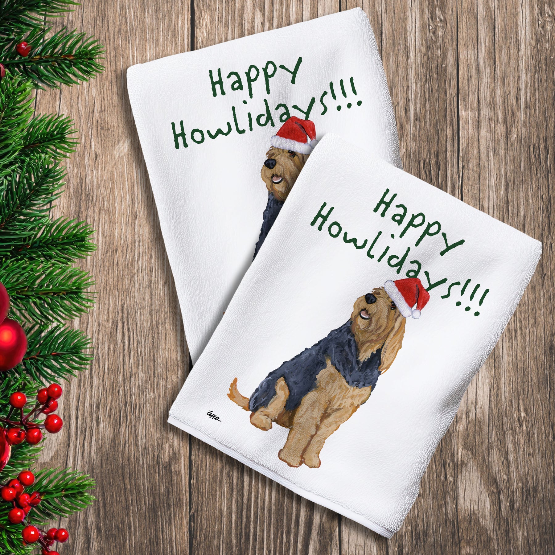 2 Kitchen Towels with an Otterhound in a Santa Hat and Happy Howlidays text.
