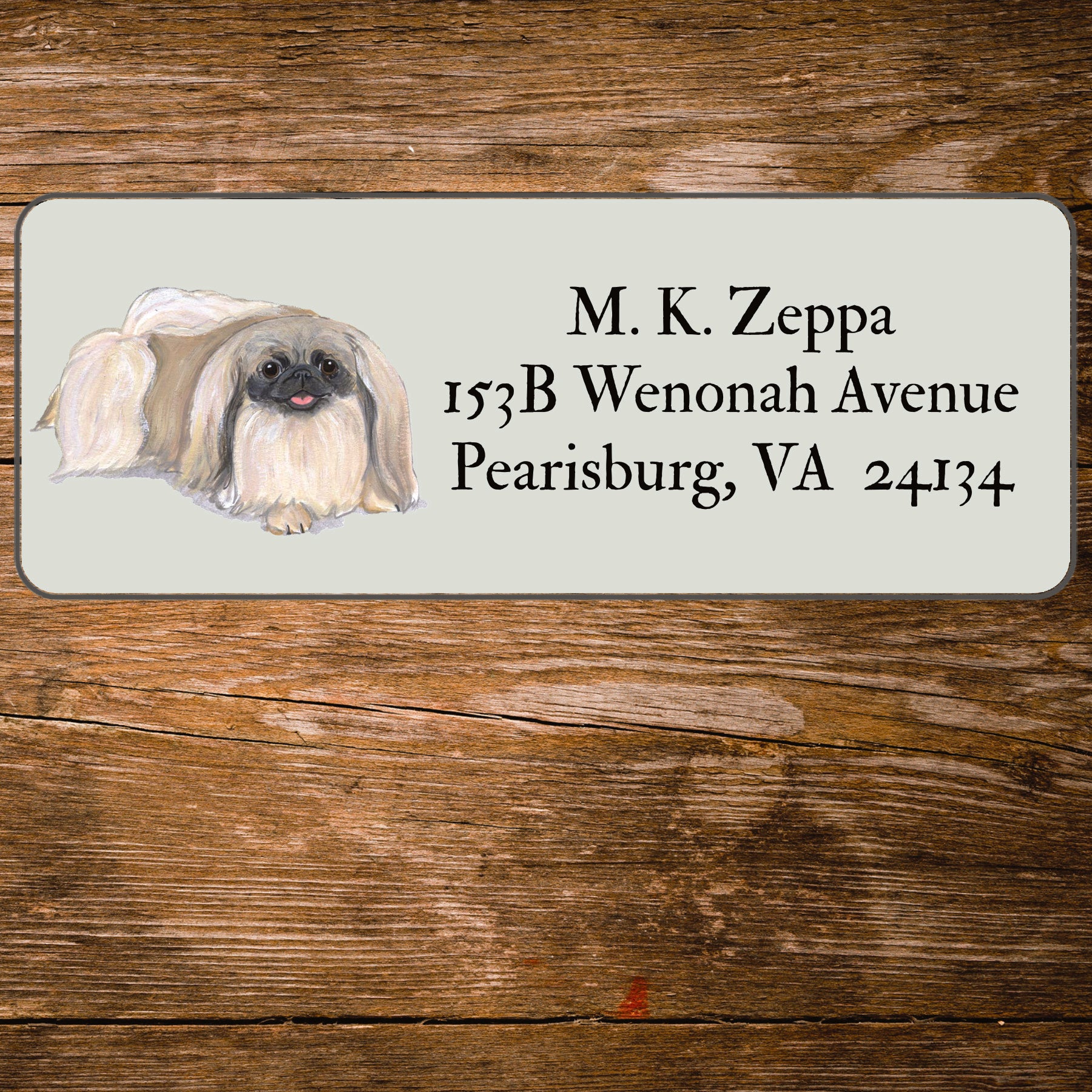 Return address label with a Pekingese dog illustration.