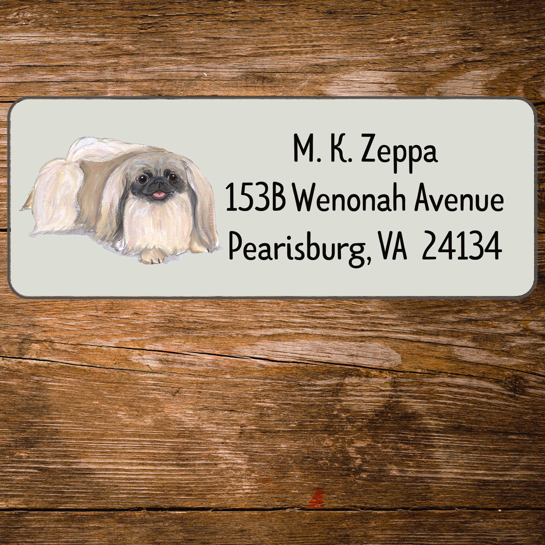 Return address label with a Pekingese dog illustration.