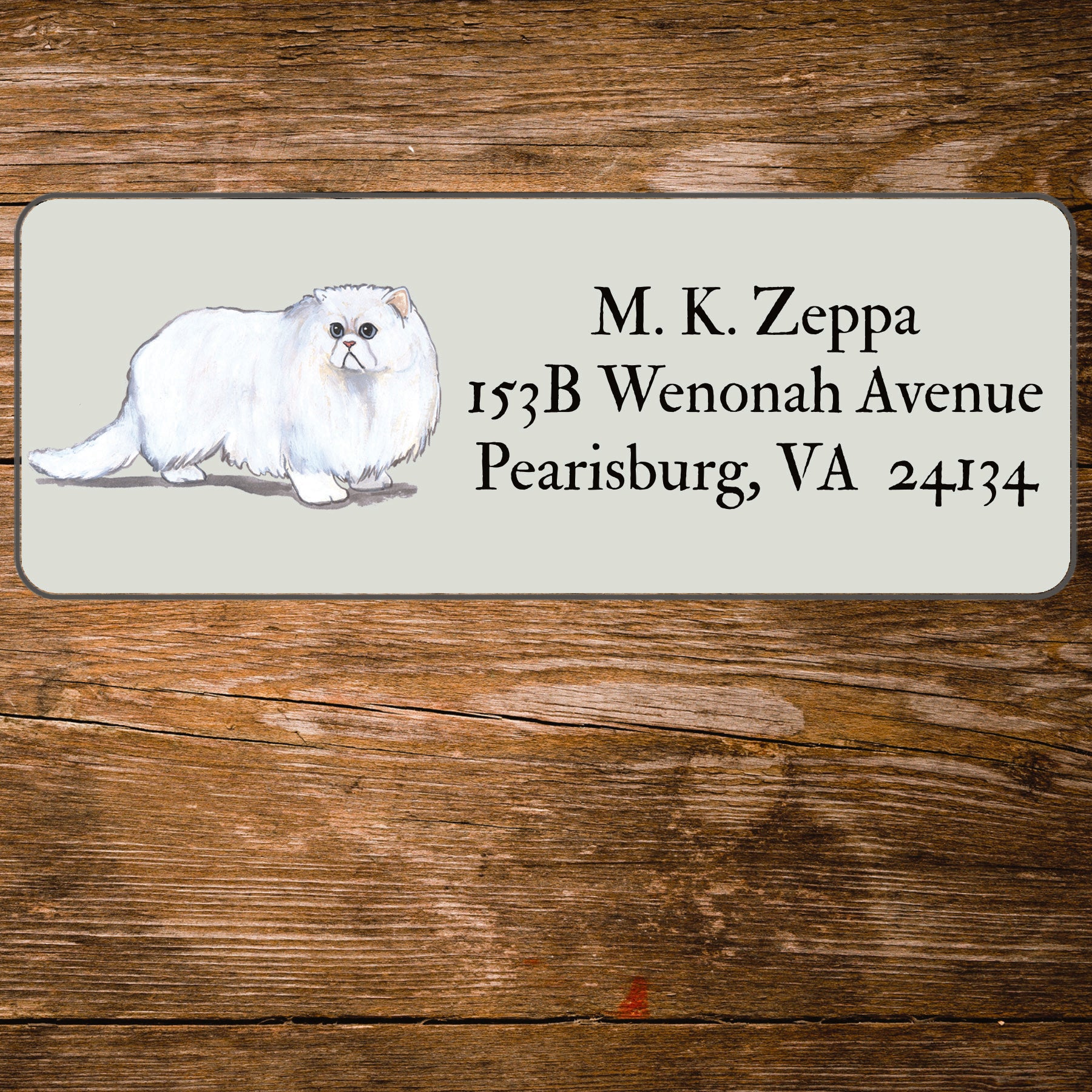 Return address label with a Persian Cat illustration.